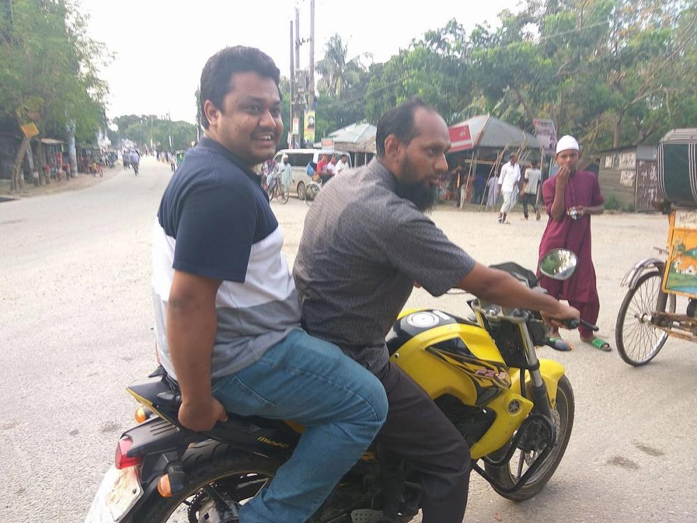 Dr. Khalilur Rahman with Kafi Bhai on a bike during Eid