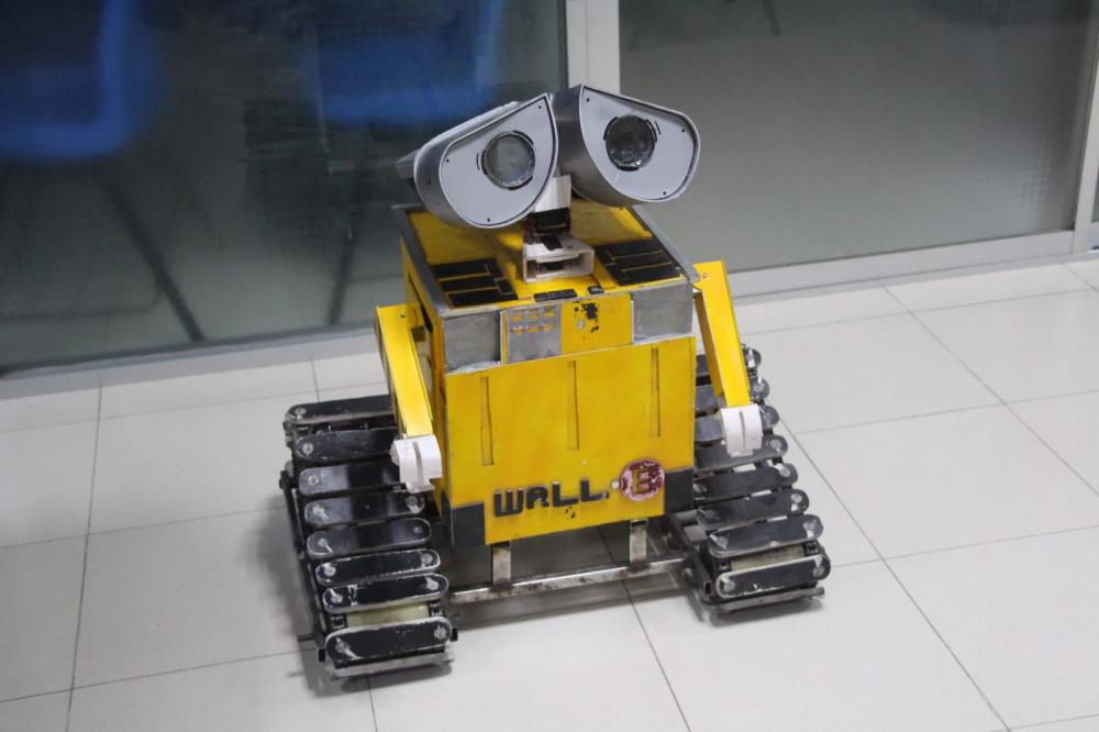 Close-up of BRACU's yellow WALL-E replica robot.