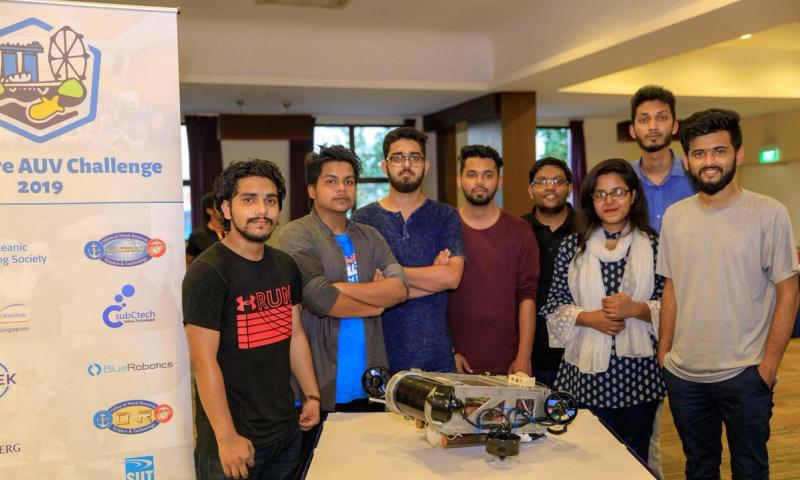 The full BRACU Duburi team posing with Duburi 2 at SAUVC 2019 in Singapore.