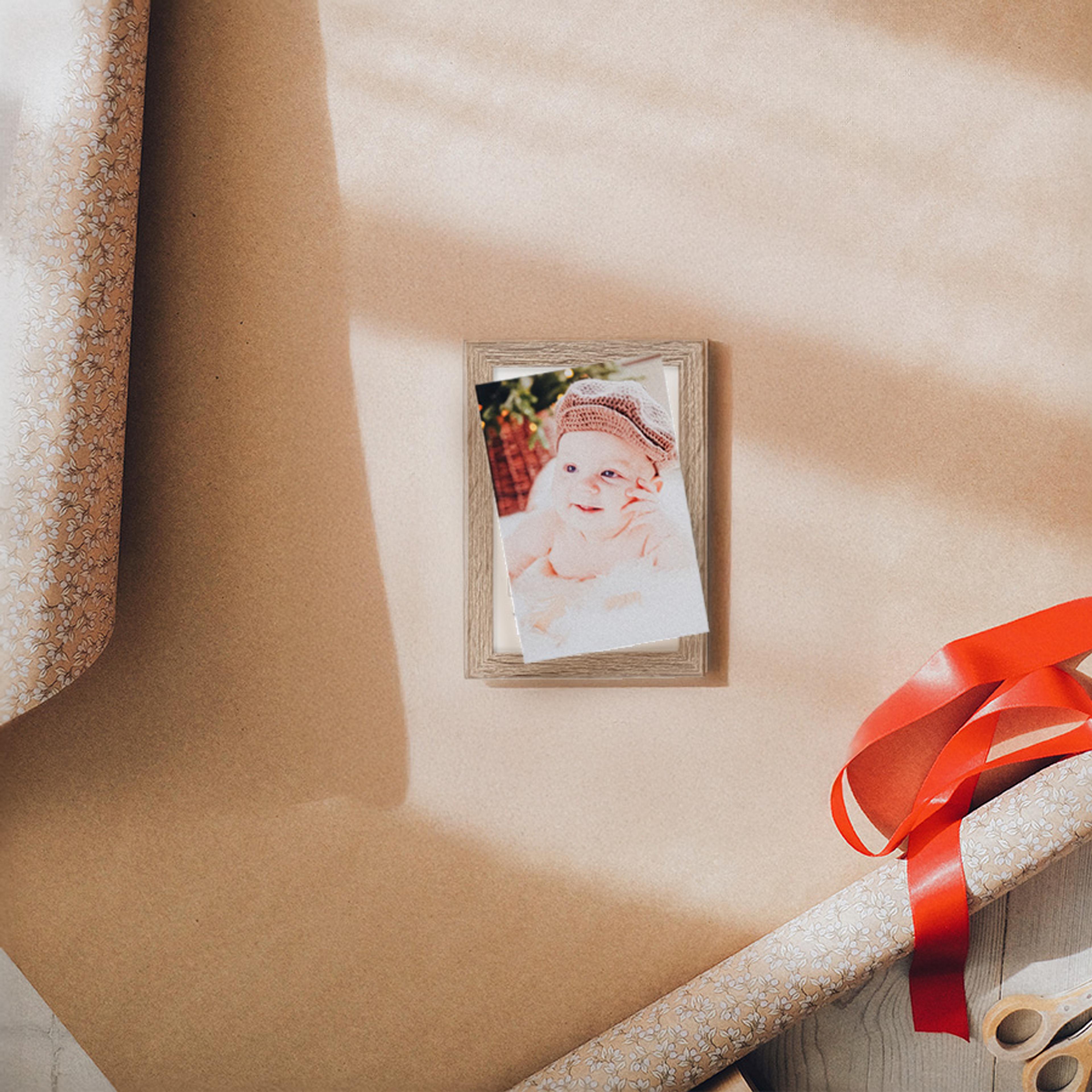 Ramme i antikk eik med et bilde