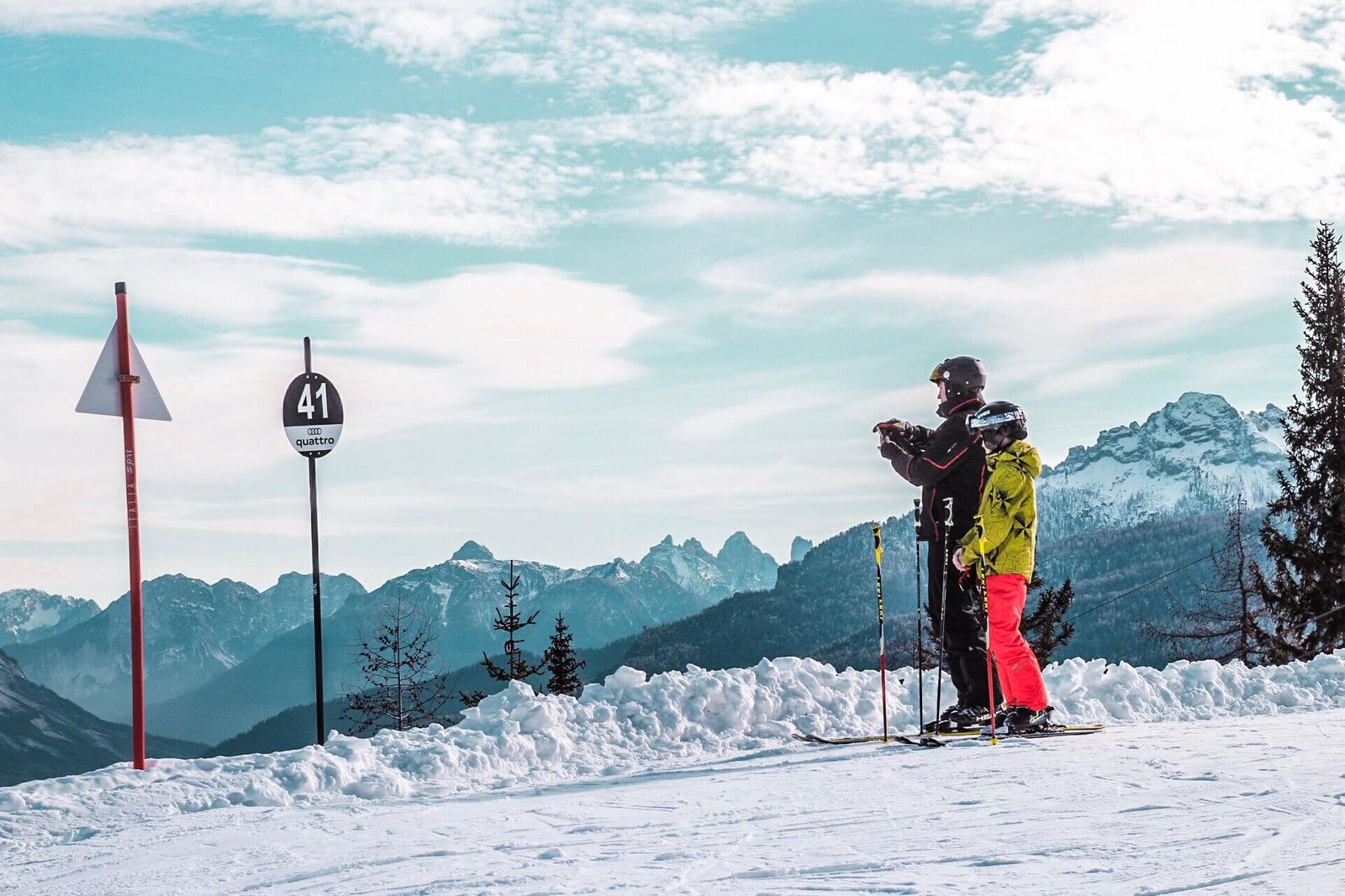 Adult and child looking out over Cortina at the Col Druscié A piste in Cortina