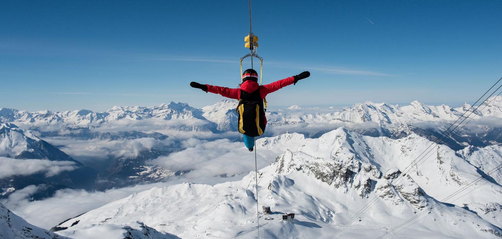 Person riding the T4 Zipline in Verbier