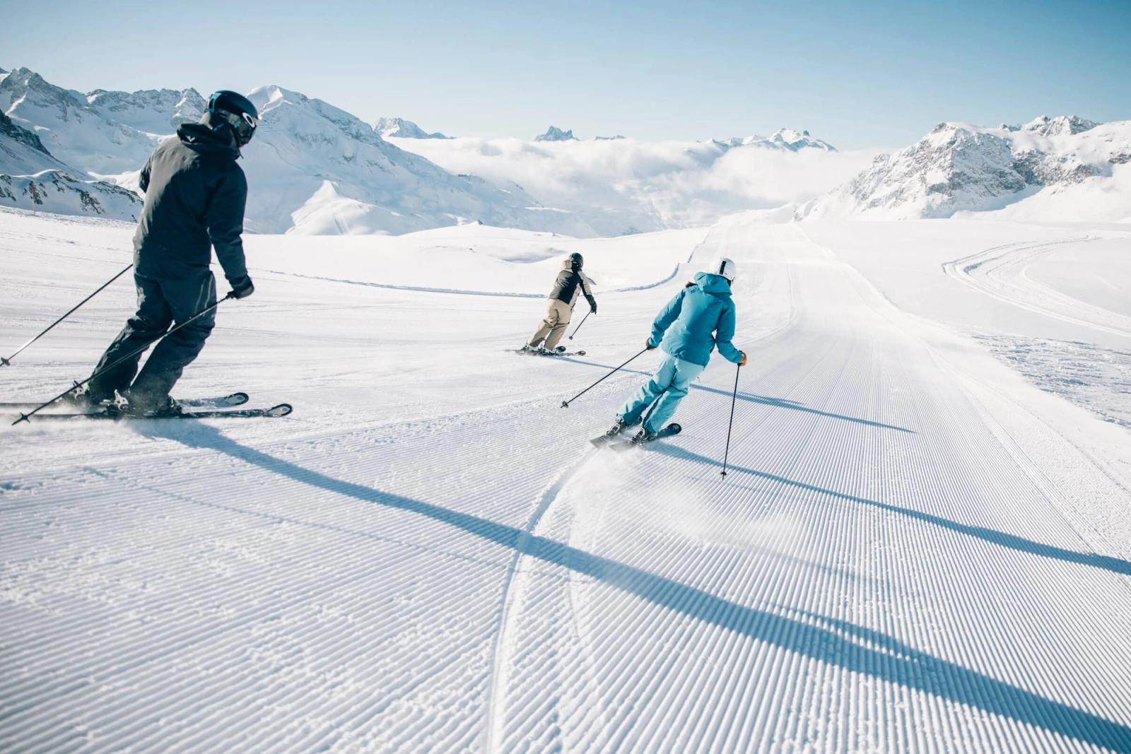 Family skiing together in Lech