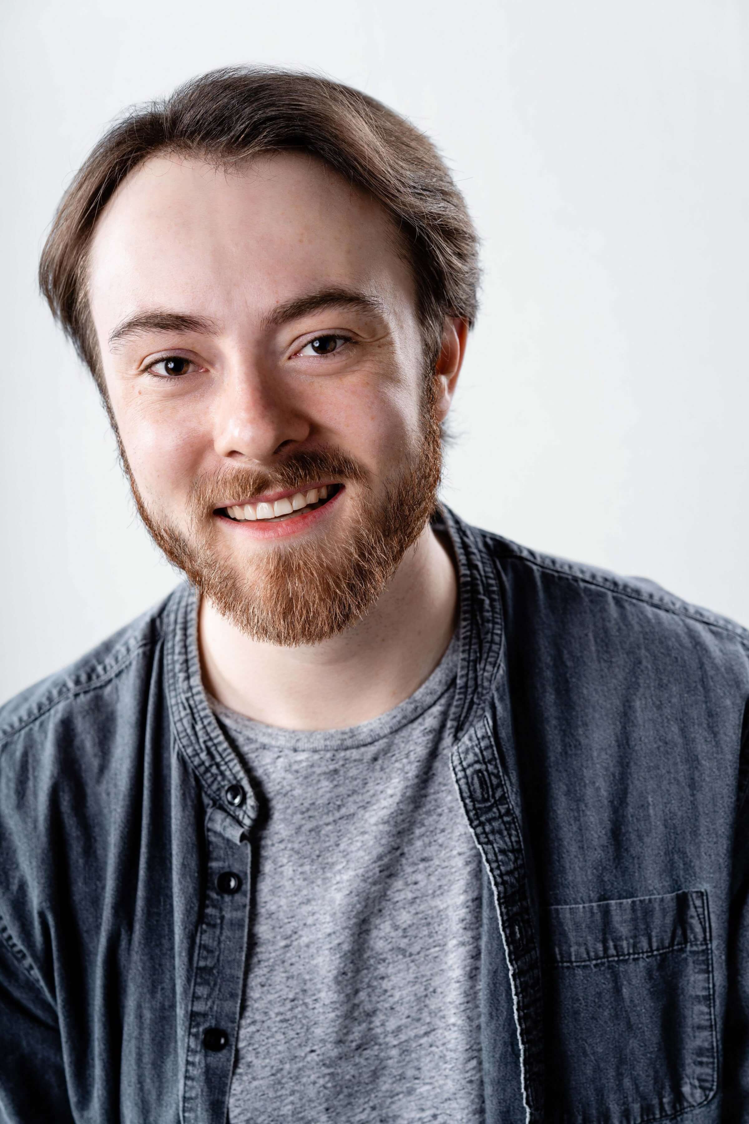 Headshot of Jordan Wilson against a white backdrop
