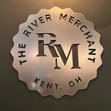 River Merchant Bottle Cap Shaped Metal Sign