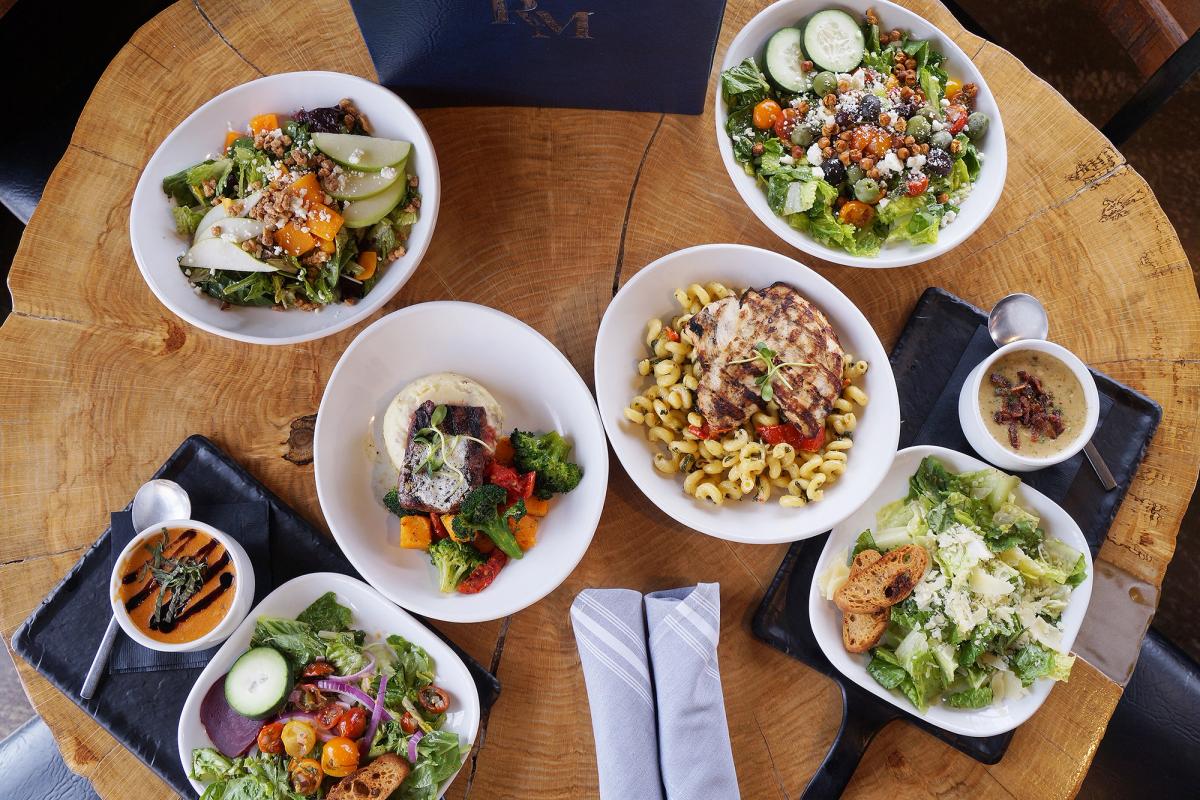 Assortment of entrees on wooden table