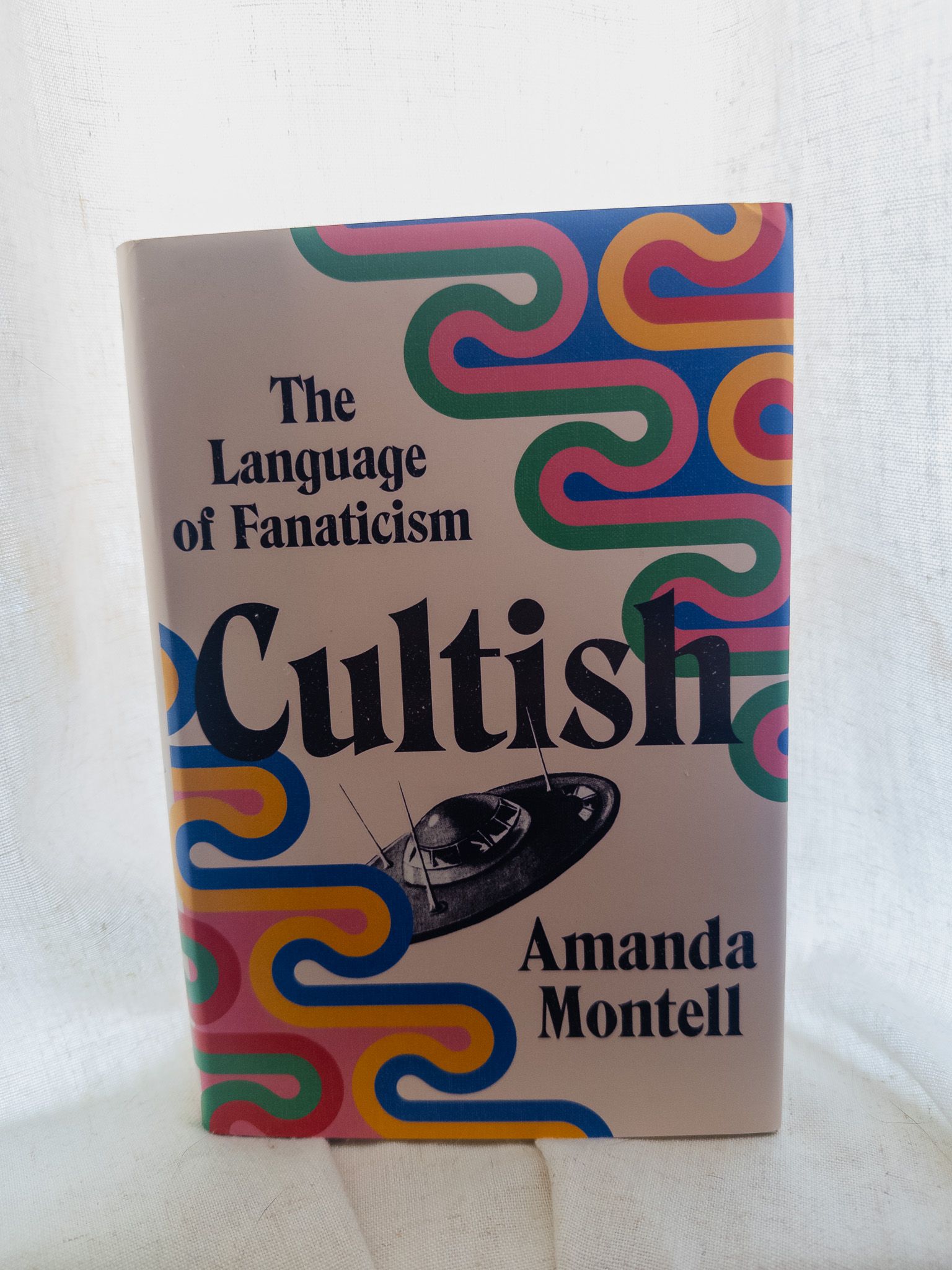 "Cultish: The Language of Fanaticism" by Amanda Montell.