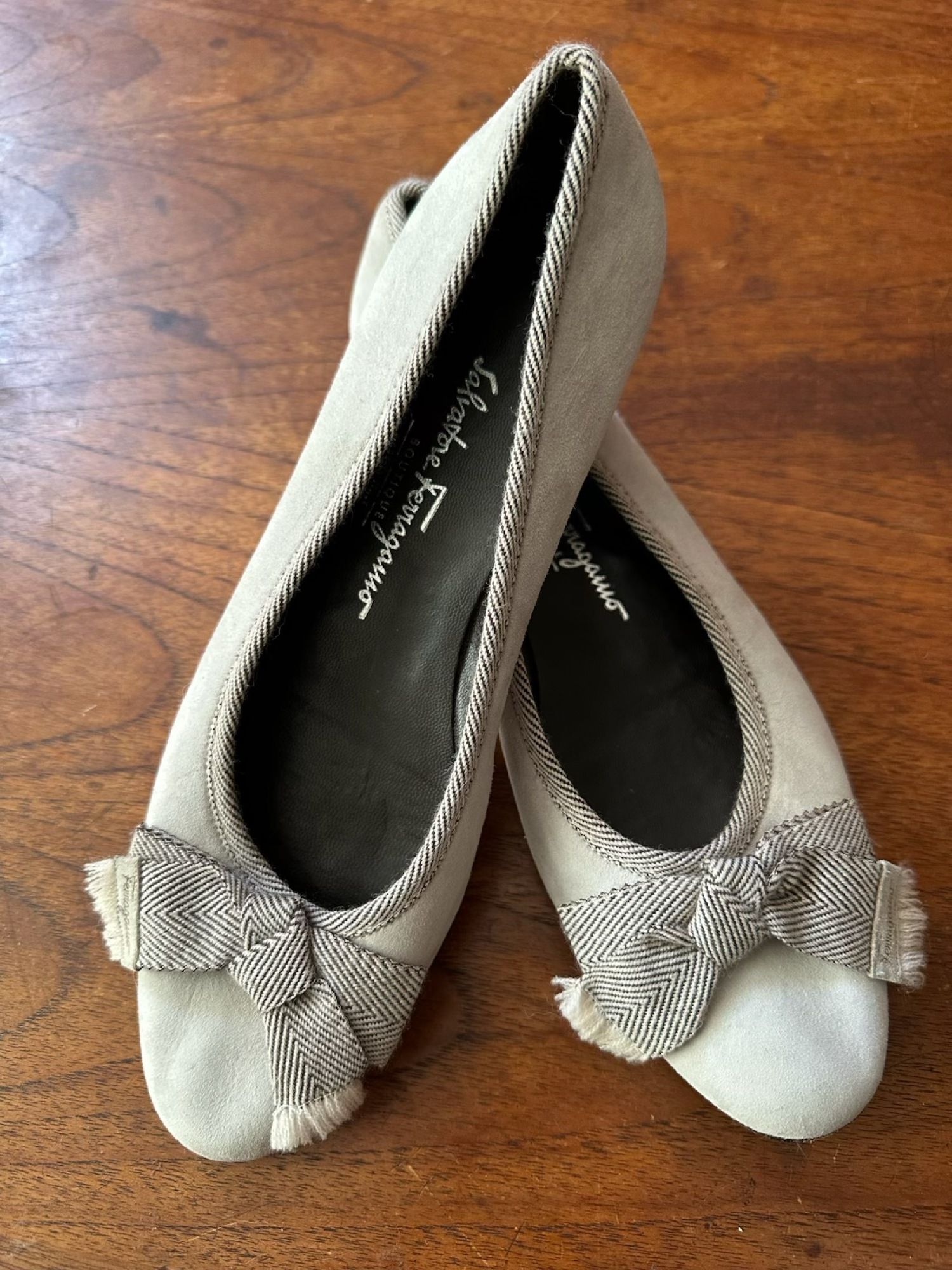 Light grey suede Ferragamo flats with a brown herringbone tweed tassel bow, size 9 1/2 B.