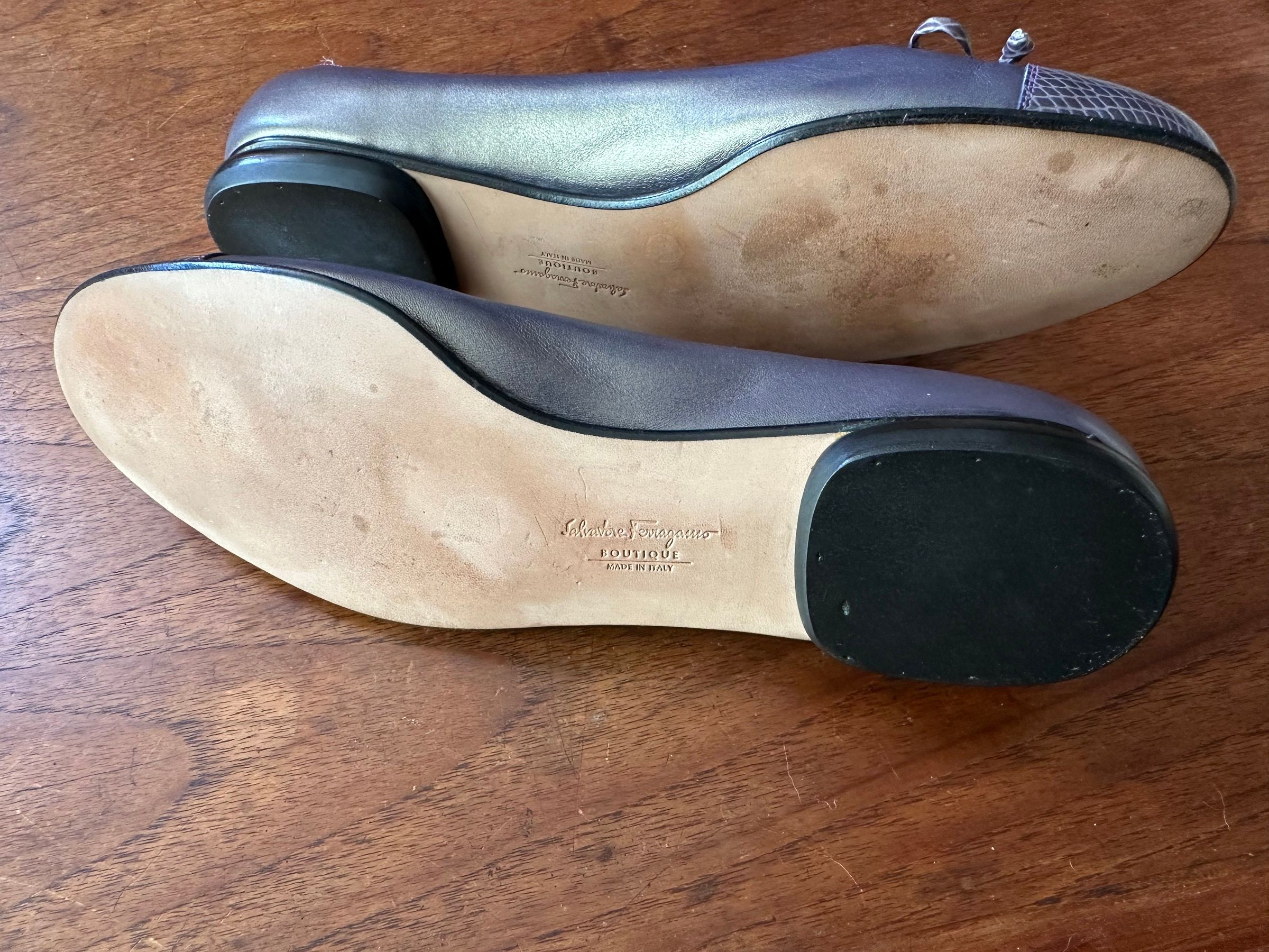 Metallic pewter Ferragamo flats with snakeskin-pattern toebox and bow, size 9 B.