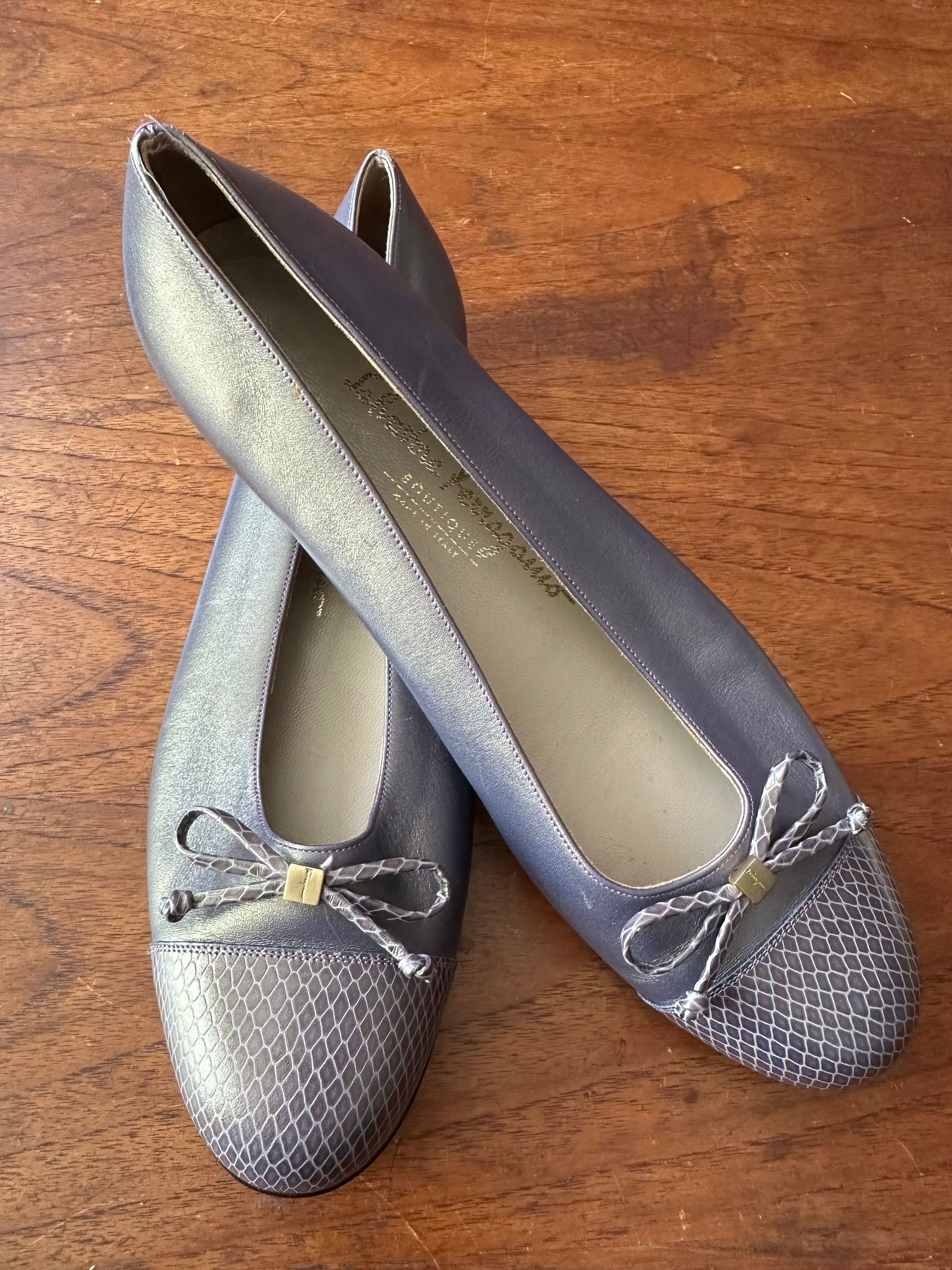 Metallic pewter Ferragamo flats with snakeskin-pattern toebox and bow, size 9 B.