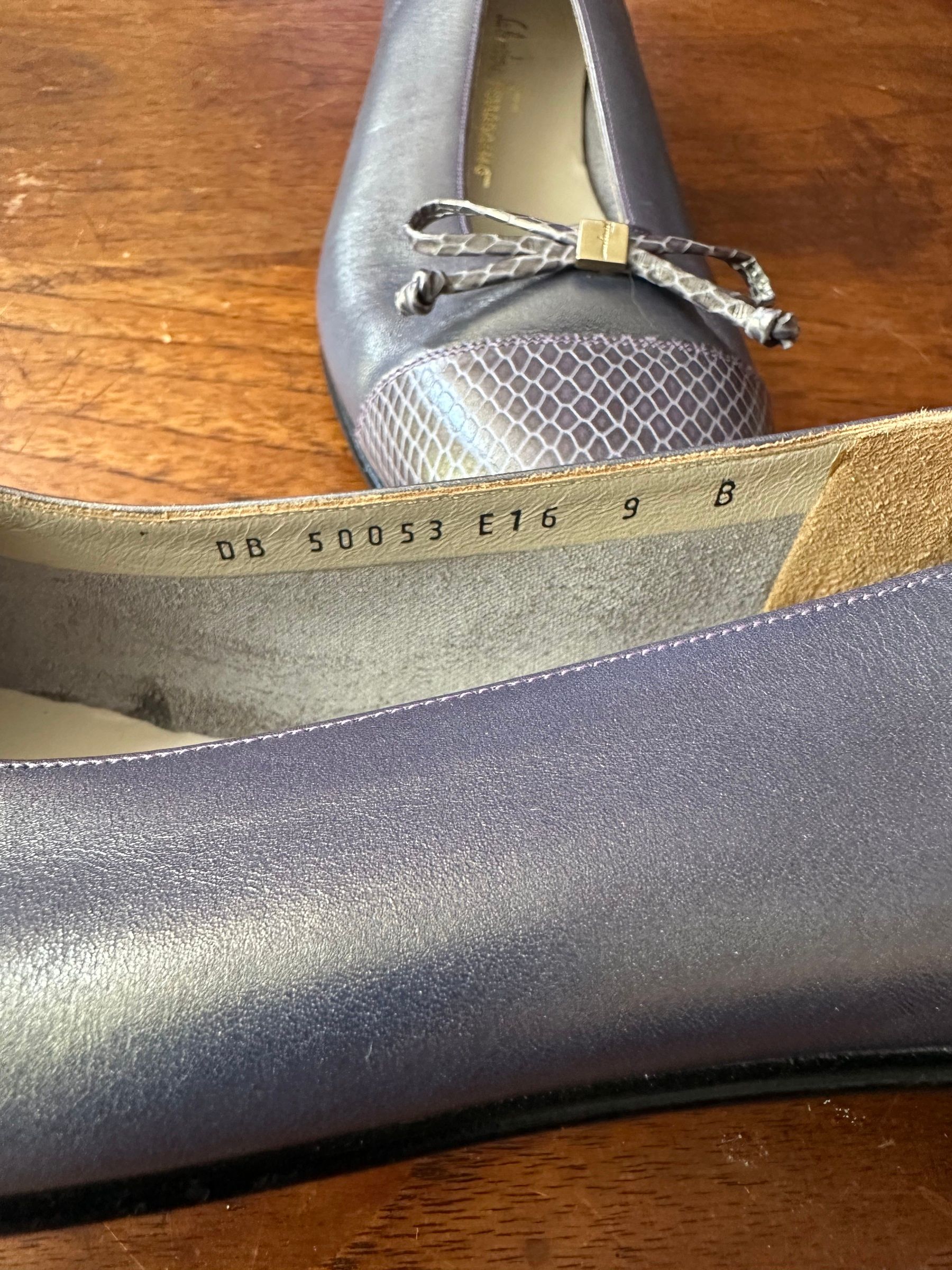 Metallic pewter Ferragamo flats with snakeskin-pattern toebox and bow, size 9 B.