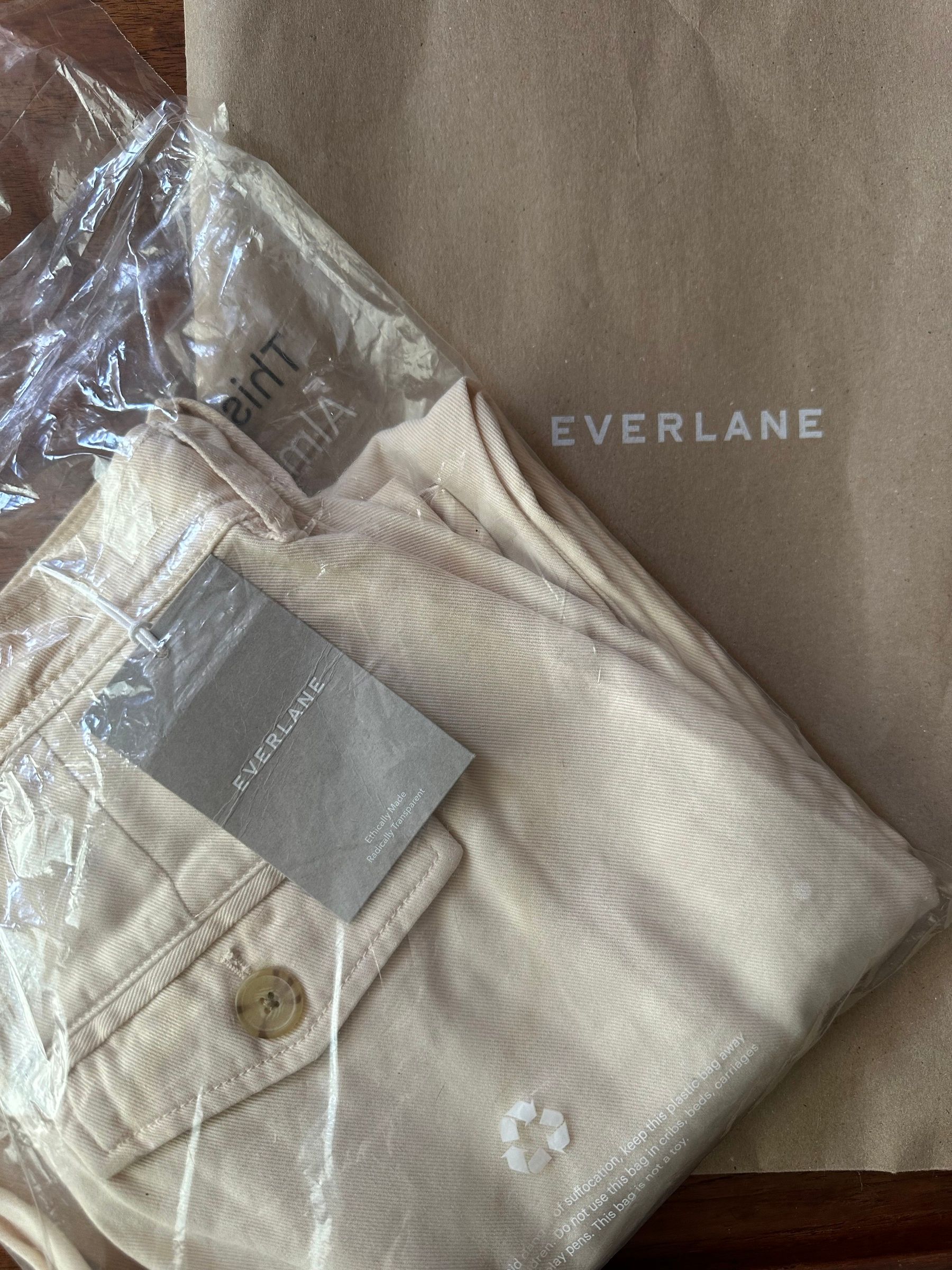 Everlane cream barrel pants, new with tags, in the Everlane packaging.