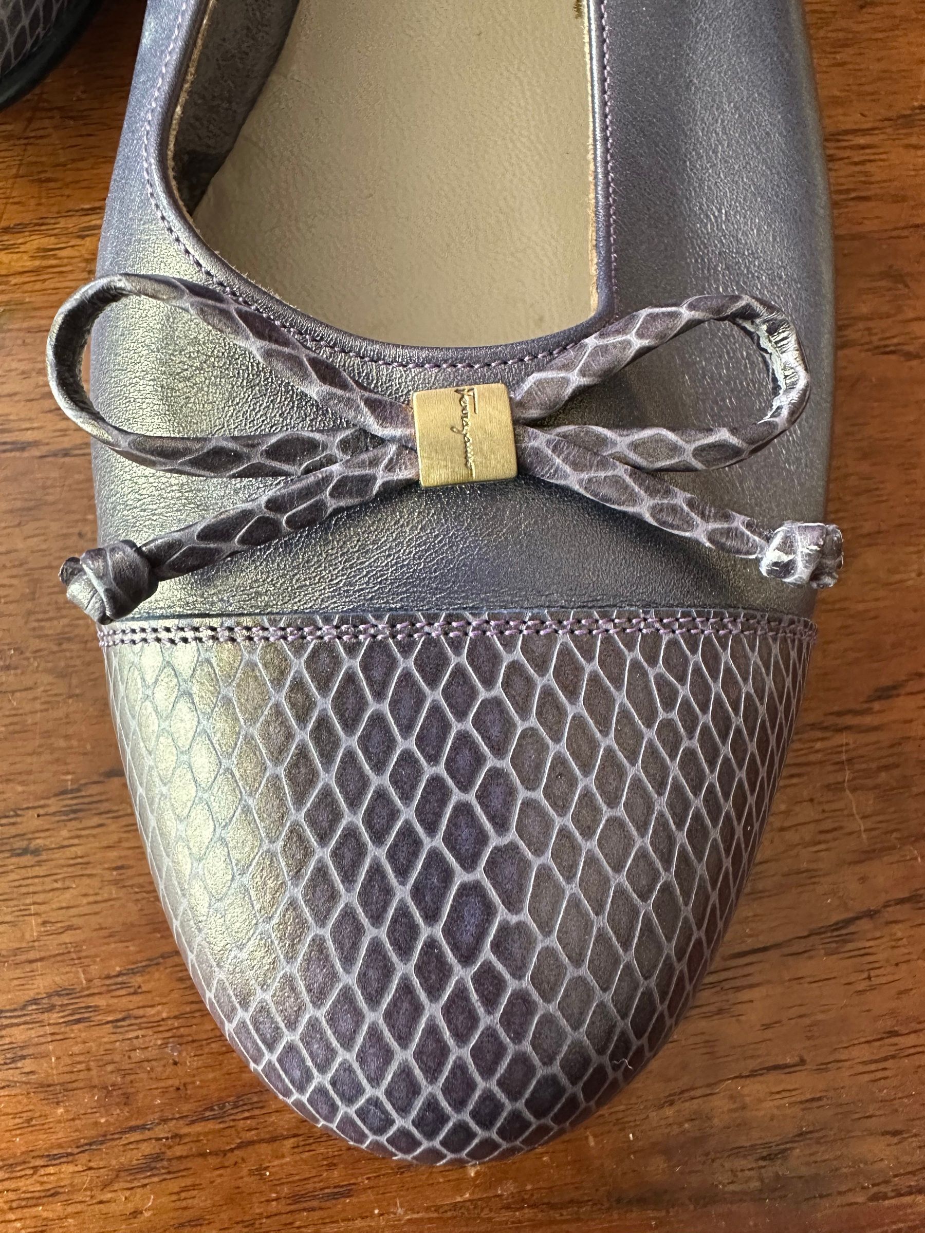Metallic pewter Ferragamo flats with snakeskin-pattern toebox and bow, size 9 B.