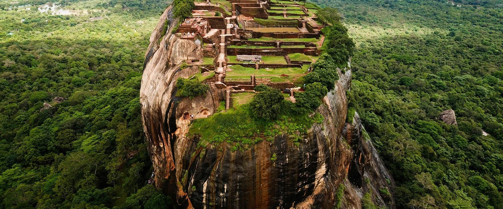 Aerial view of Sigiriya Lion Rock fortress ruins rising above the jungle in Sri Lanka