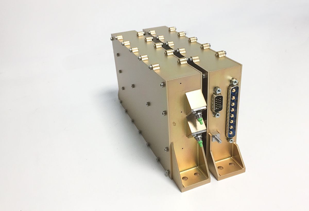 Pair of compact G&H custom OEM fiber optic modules in metal housings, featuring optical connectors, electrical interfaces and mounting brackets.