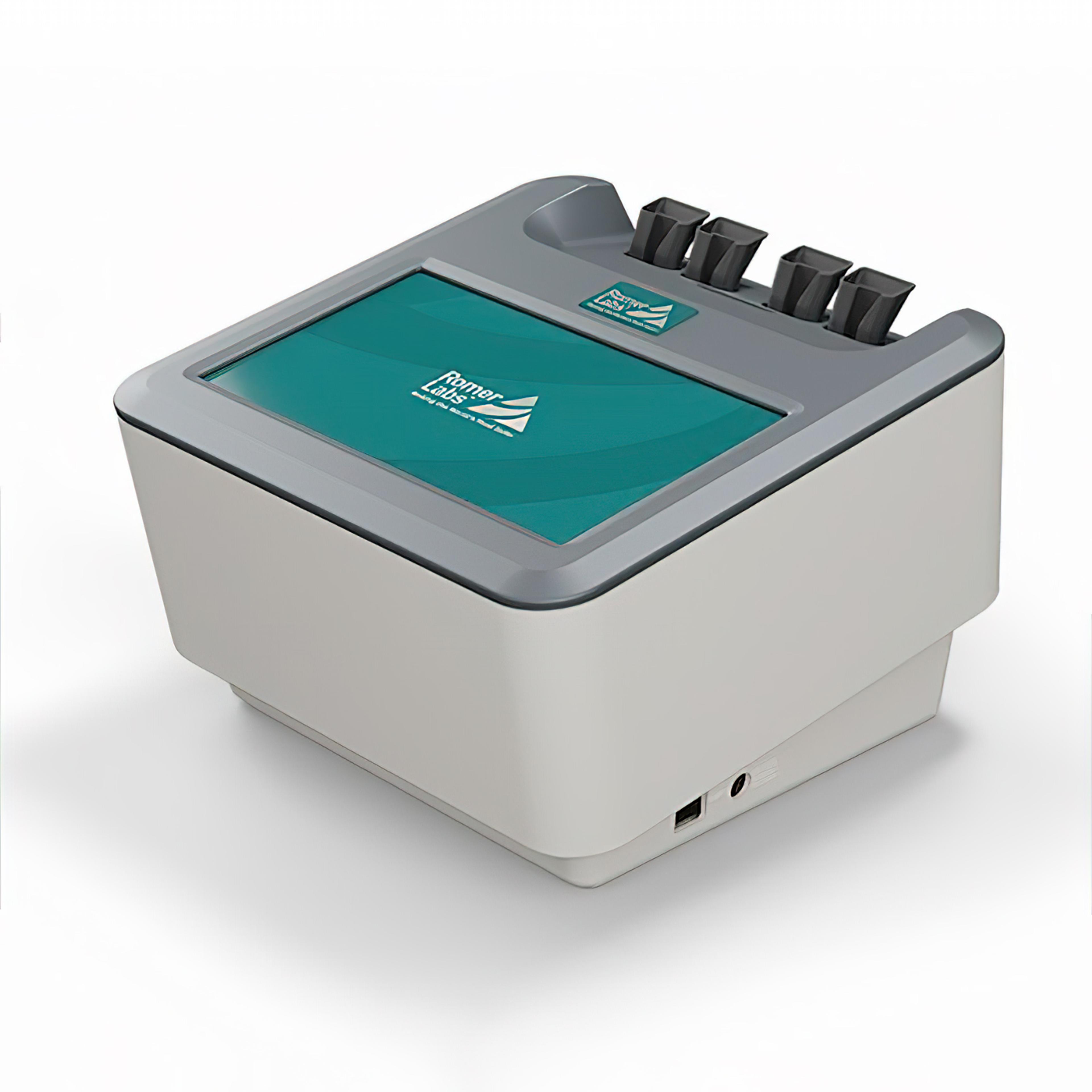 Product image of the AgraVision Pro reader, showing a compact benchtop diagnostic instrument with a large angled touchscreen display, four cartridge or sample ports along the top edge, and a clean white-and-grey housing against a plain background. The image highlights a modern analyser design intended for streamlined testing, readout, and laboratory or point-of-care workflow use.