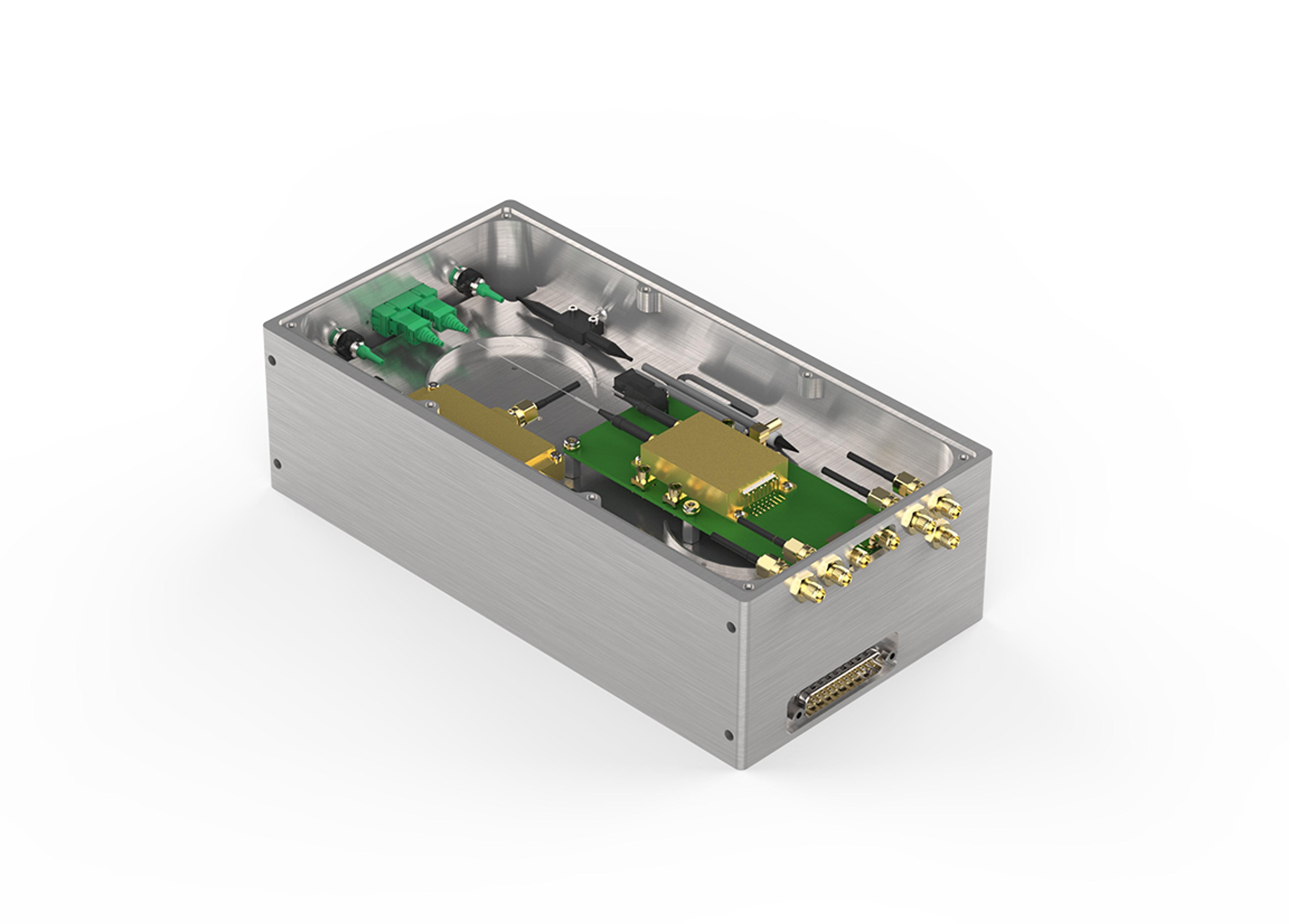 Compact photonic laser engine module featuring precision optical components, fiber connections, and integrated electronics in a metal housing