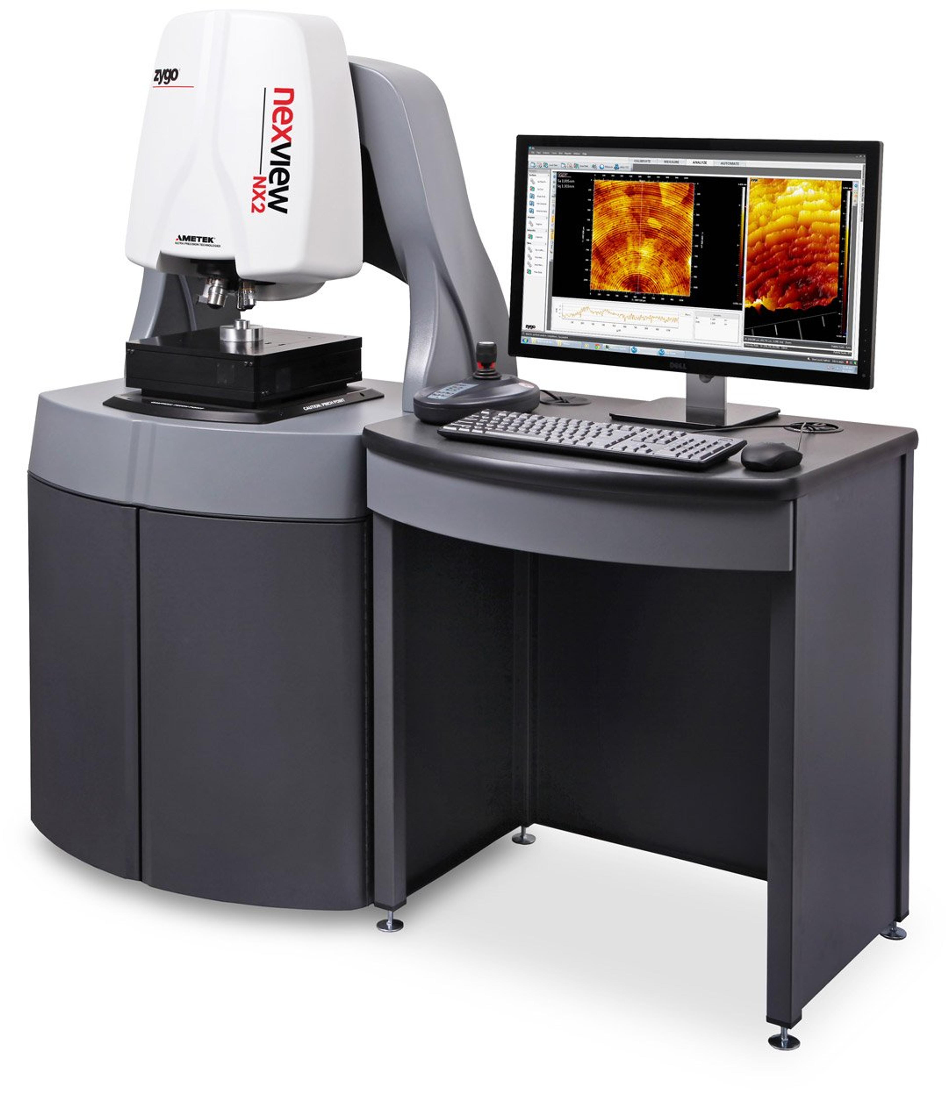 A high-precision optical measurement system featuring the Zygo Nexview NX2 optical profiler. The system includes a large white and grey profiler unit mounted on a black base, positioned beside a connected workstation with a computer monitor, keyboard, mouse, and joystick control. The monitor displays detailed 3D surface topography scans in vivid orange and yellow colors. The entire setup is designed for advanced surface metrology and analysis