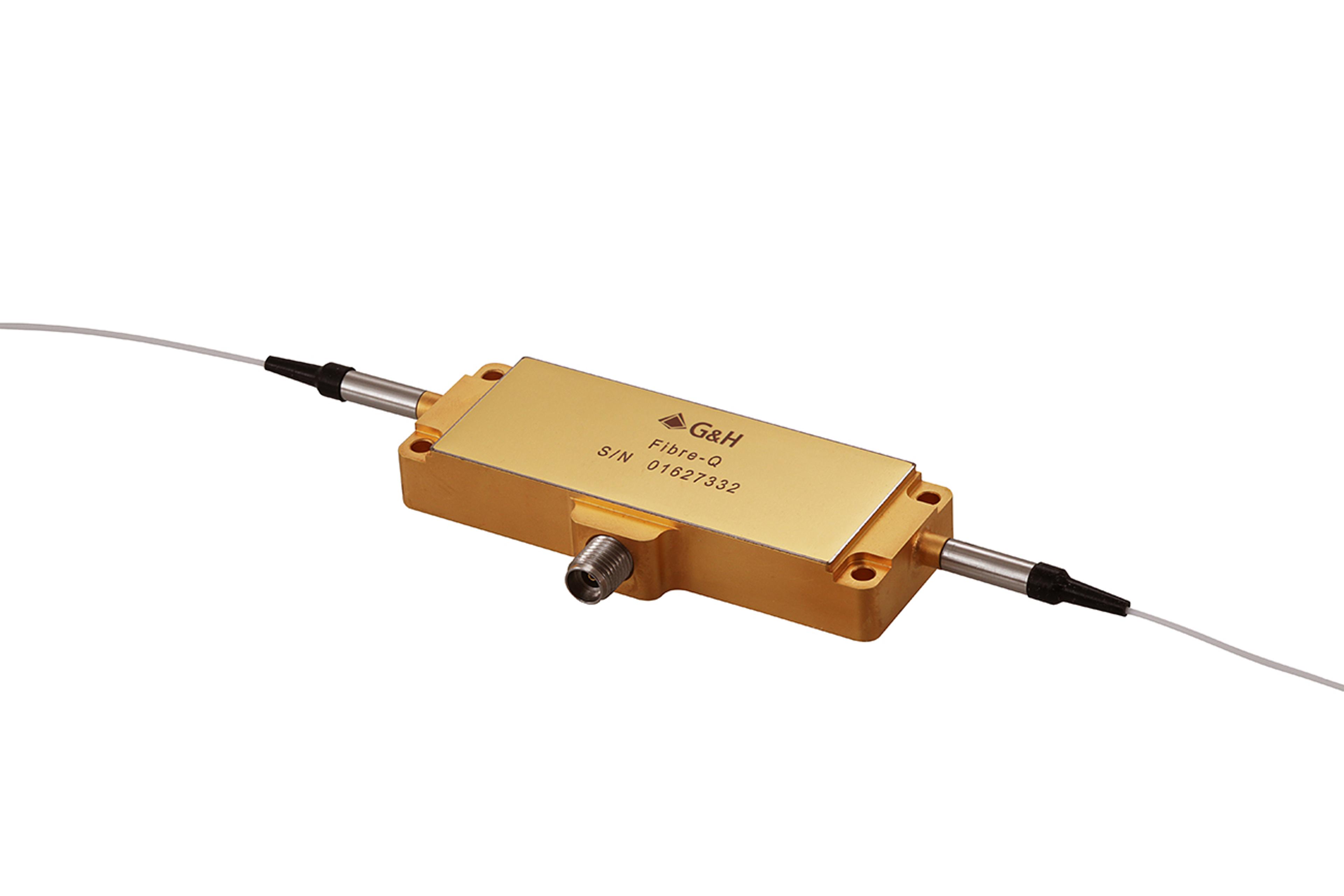 Gold G&H Fibre-Q module with fibre pigtails on both ends and an RF connector on the side, shown on a white background.