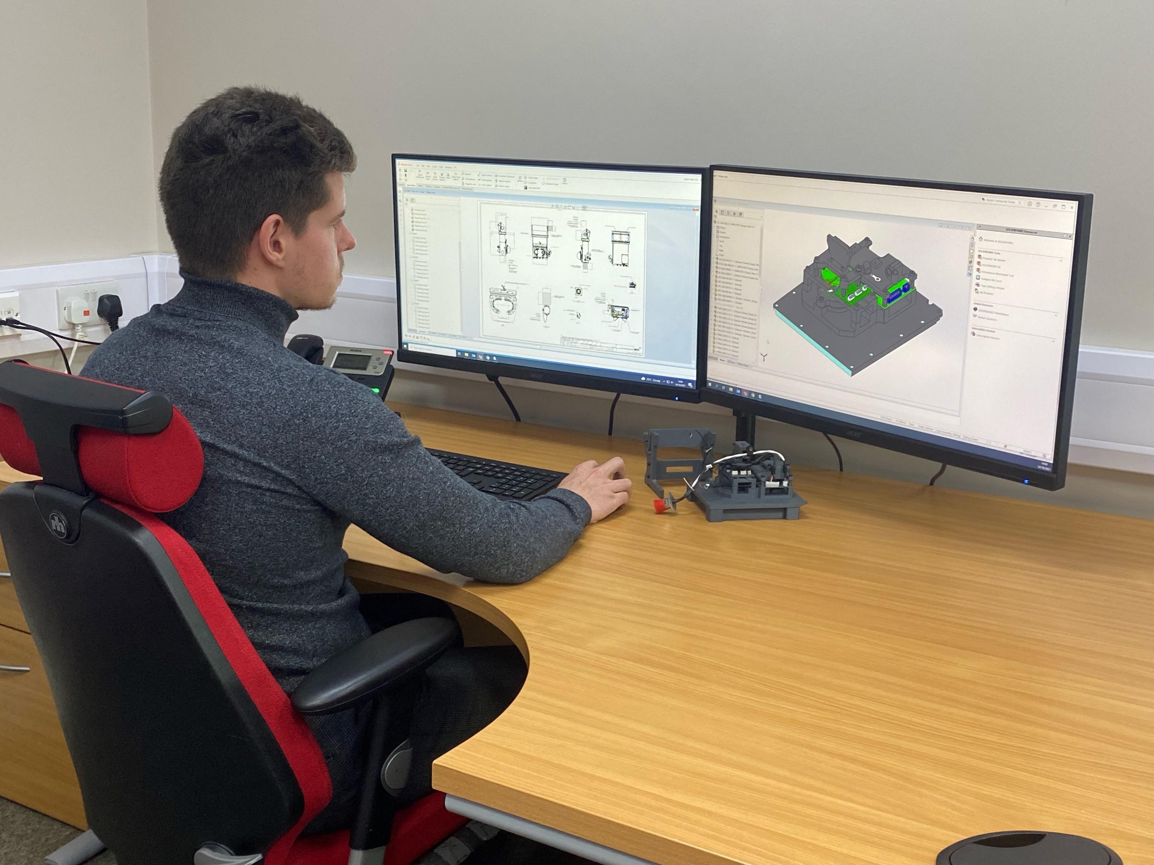 Engineer at the G&H Optical Systems Innovation Hub engaged in opto-mechanical design