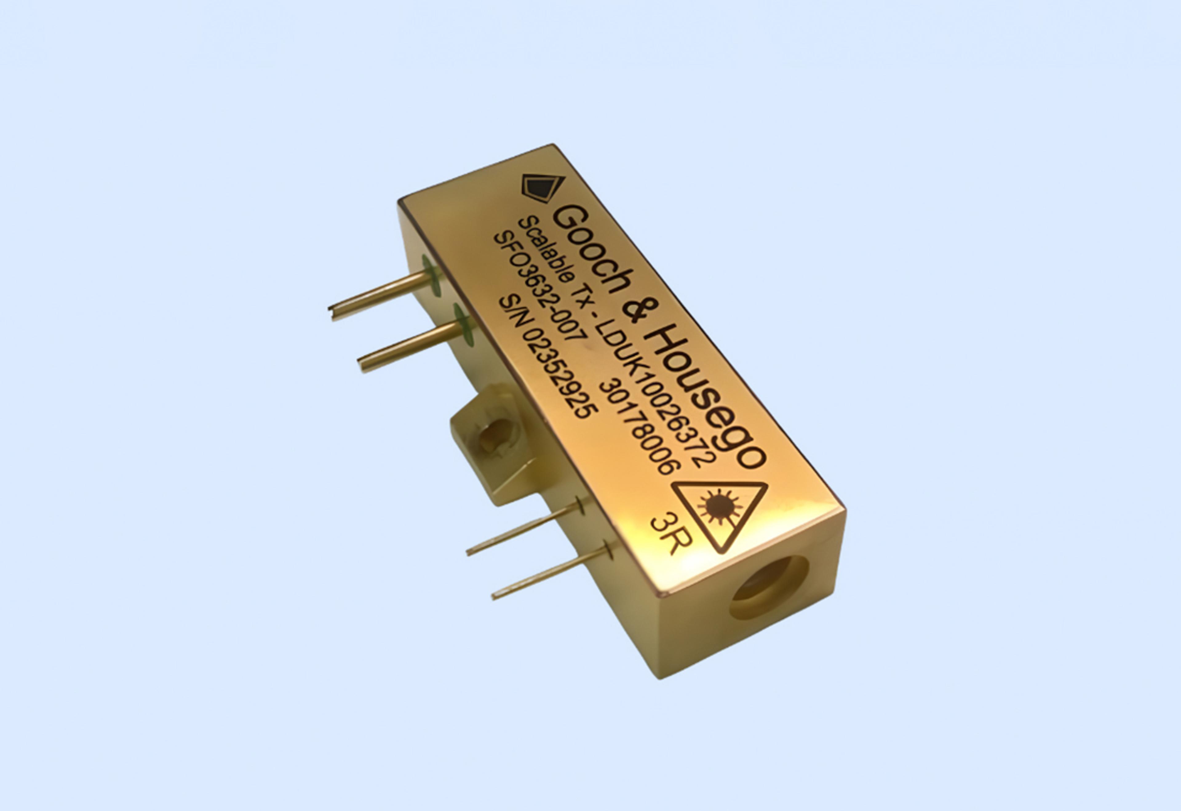 Gold Gooch & Housego diode-pumped solid-state laser module with pin connections and a Class 3R laser warning symbol, shown on a light background.