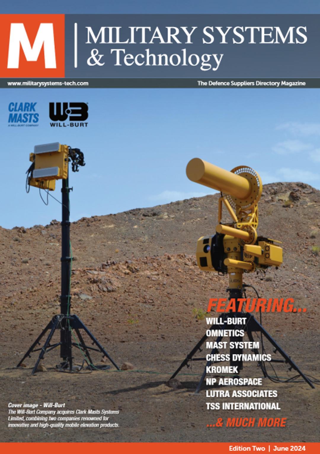 Front cover of the Military Systems & Technology magazine, Edition Two, June 2024. The title appears at the top in white text on a dark blue background, with the tagline “The Defence Suppliers Directory Magazine.” Below the title are the logos of Clark Masts and Will-Burt. The central image features two rugged, tripod-mounted surveillance or targeting systems on rocky terrain. The equipment appears specialized for military or defense use, one painted yellow with a large cylindrical sensor and the other black. The cover highlights featured companies in bold orange and white text, including Will-Burt, Omnetics, Mast System, Chess Dynamics, Kromek, NP Aerospace, and others. An orange footer notes the edition and date.