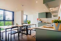 Contemporary shared kitchen and dining area at Haywood Residence, designed for comfortable student living in London.