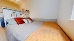 Comfortable and fully furnished ensuite student room at Highbury Residence, providing modern living in London.
