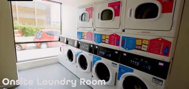 On-site laundry room equipped with multiple washers and dryers for residents' convenience.