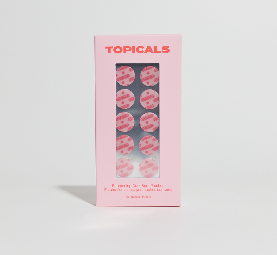 Pink TOPICALS Brightening Dark Spot Patches box displaying 10 round patches.