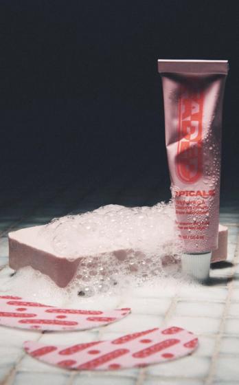 a tube of lip balm with the word tropical on it