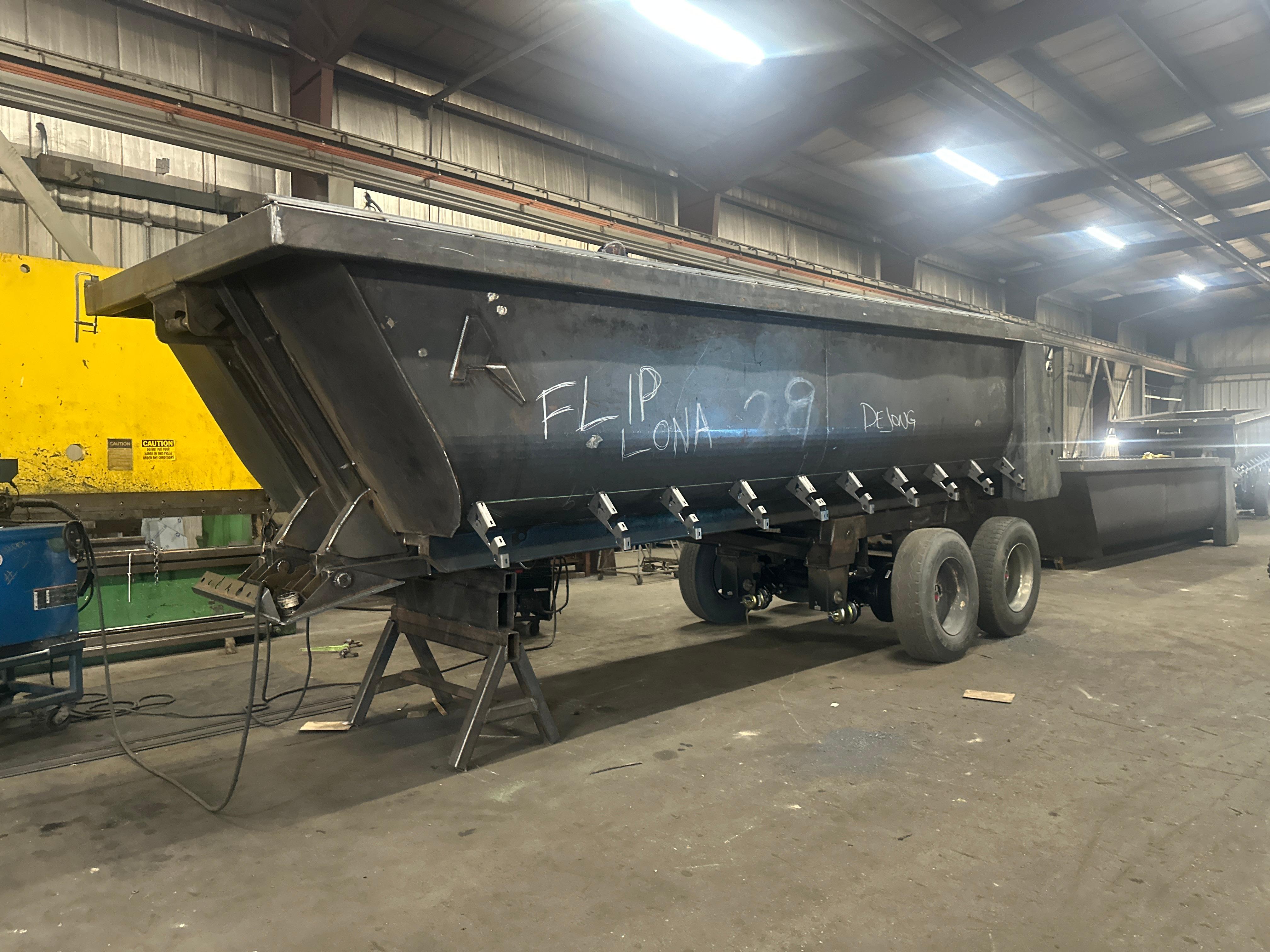 Dump trailers Cedar Rapids IA contractors use on jobsites, built by ALKO Manufacturing