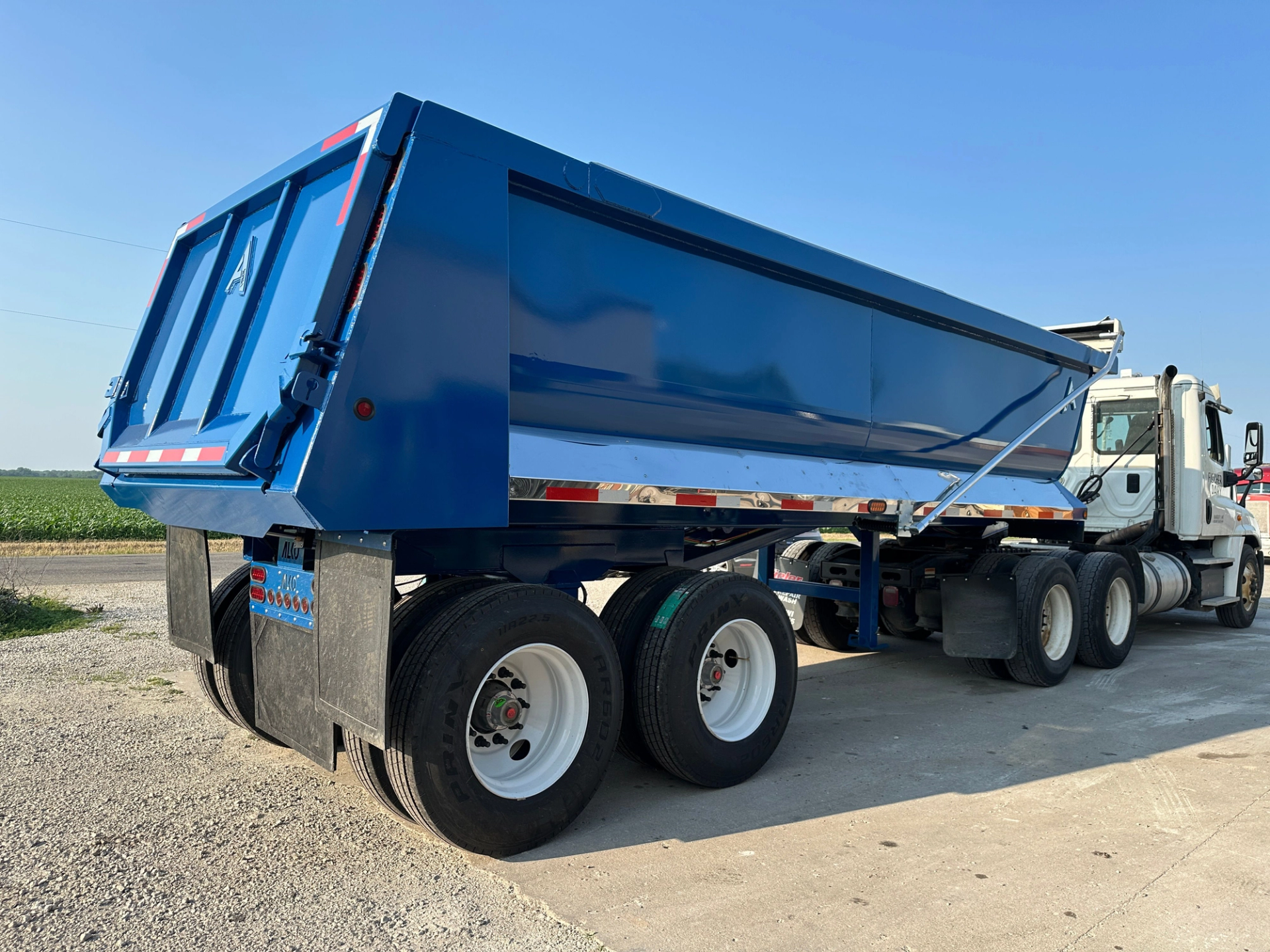Alko dump trailer on a parking lot daytime footage