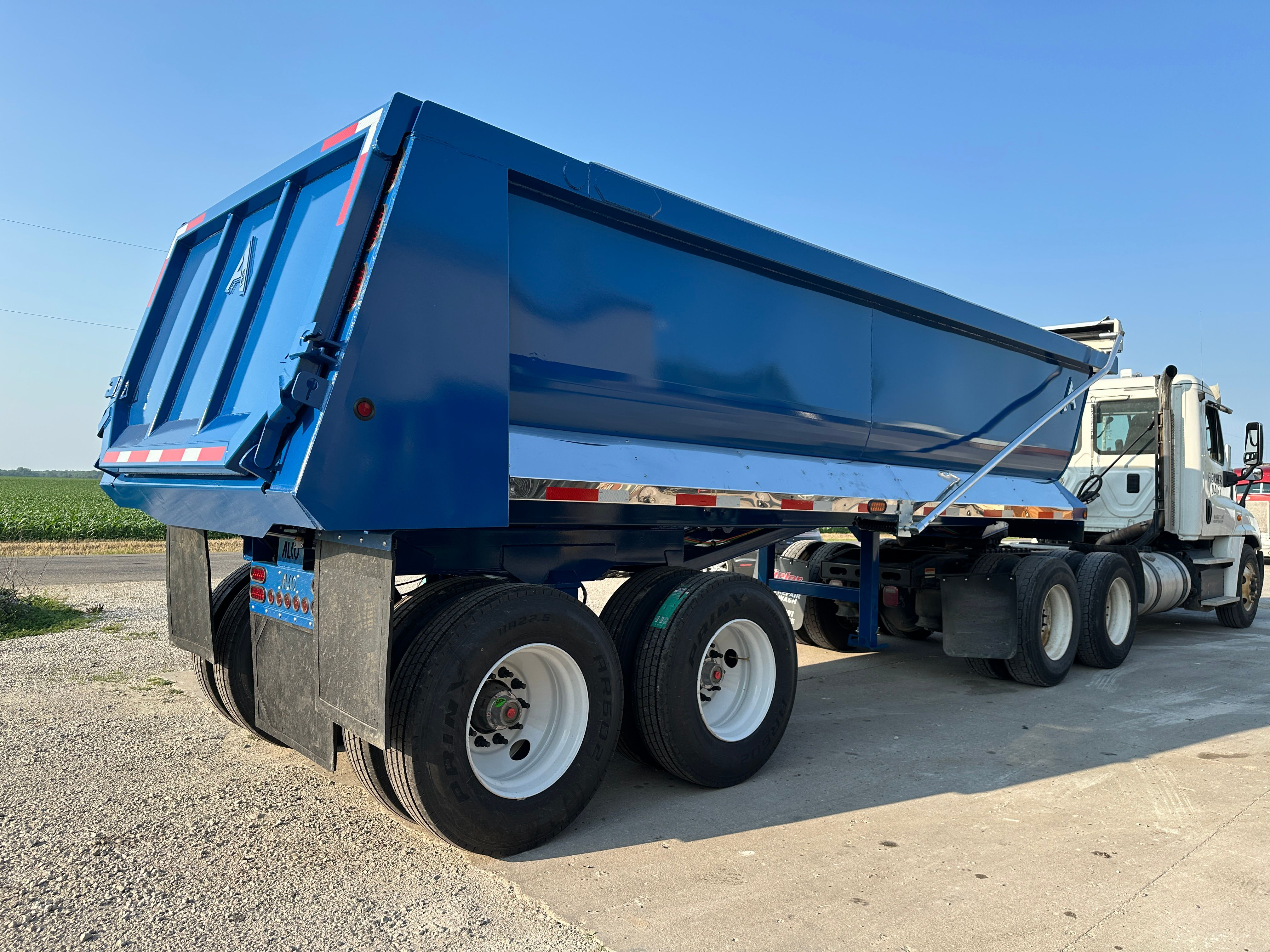 Alko dump trailer on a parking lot daytime footage