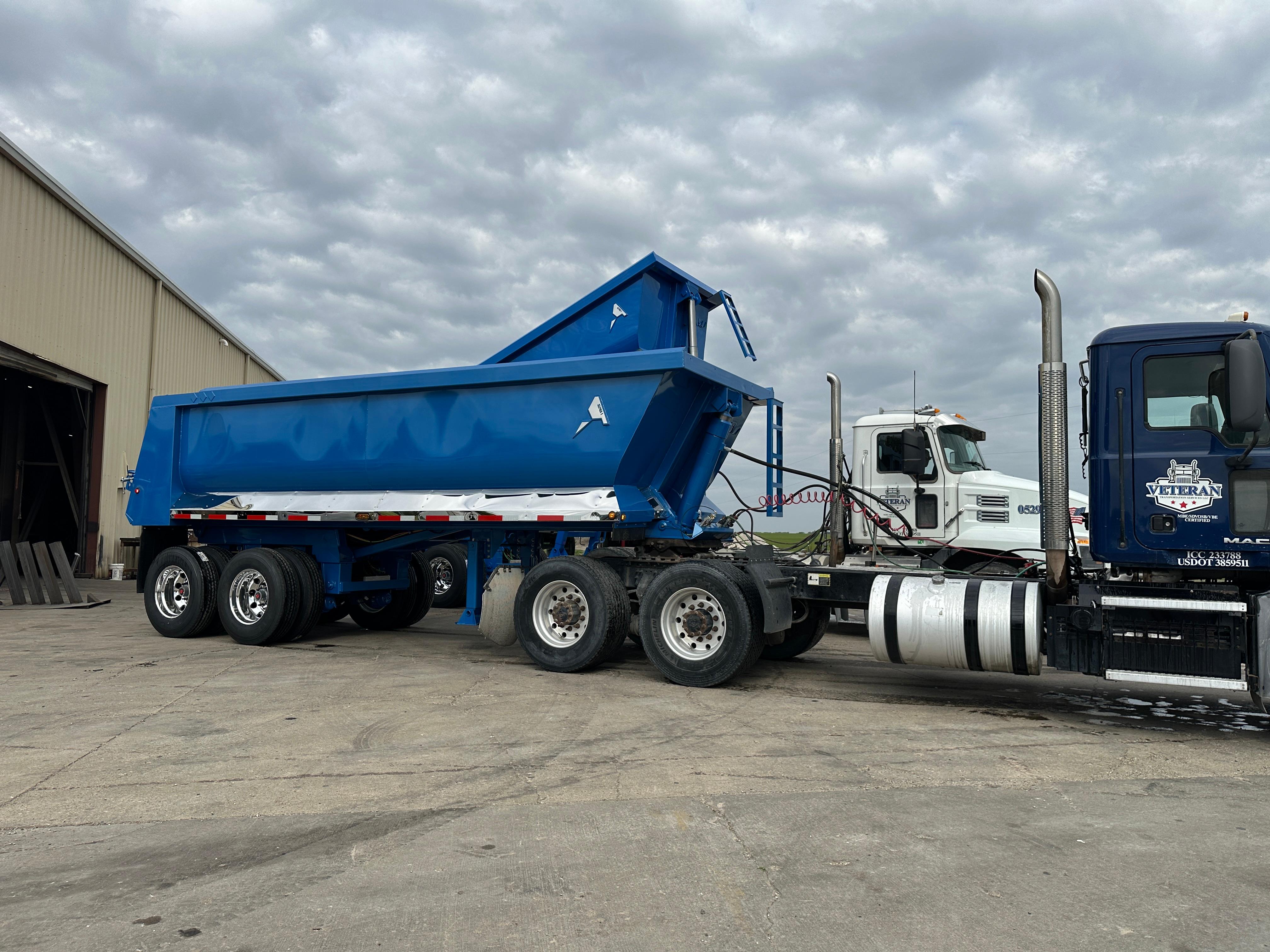 Dump trailers Cedar Rapids IA contractors use on jobsites, built by ALKO Manufacturing