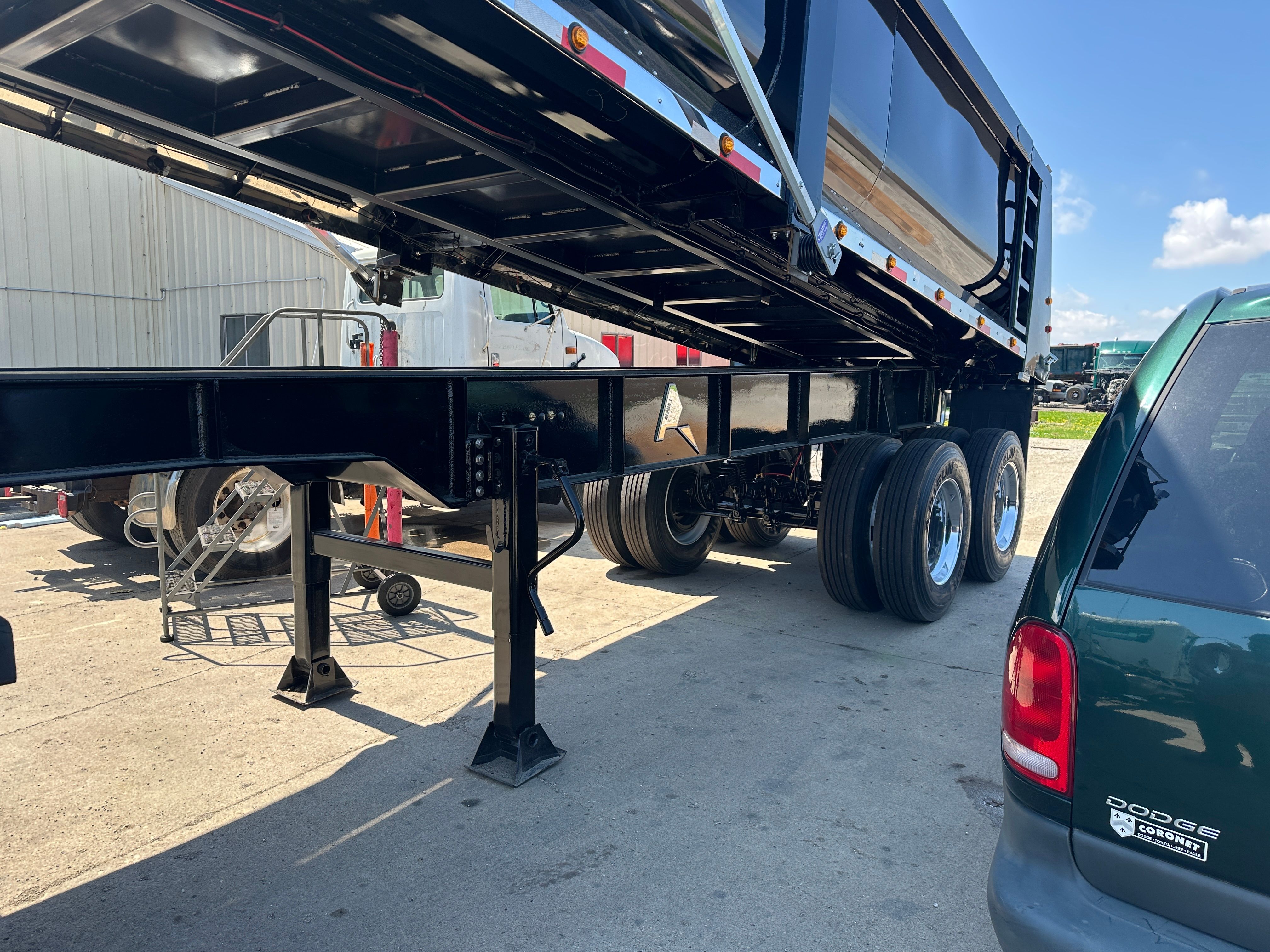 Full frame AR-steel dump trailer built for high impact loads in Cedar Rapids IA
