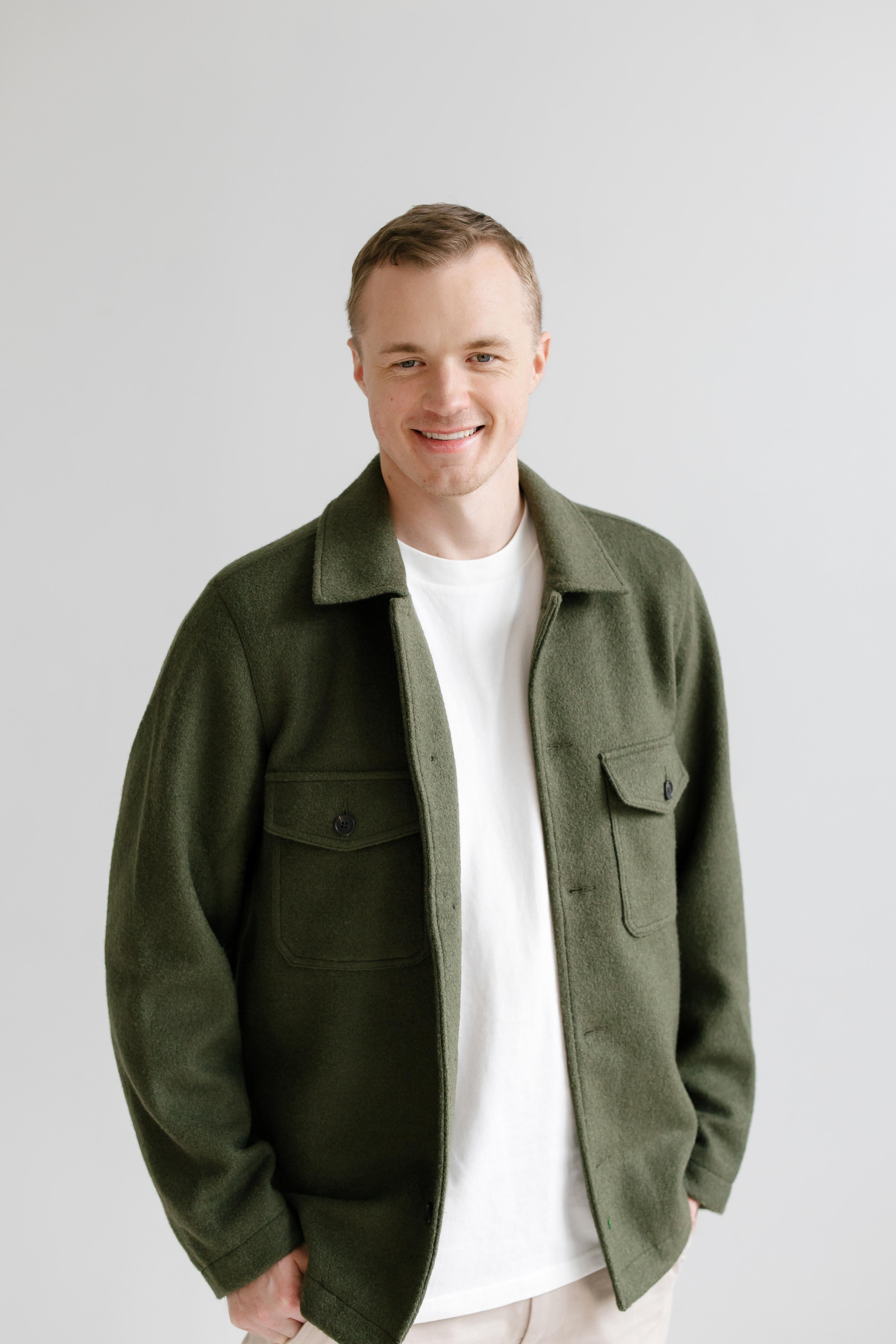 Danny Welstad smiling in a green jacket.