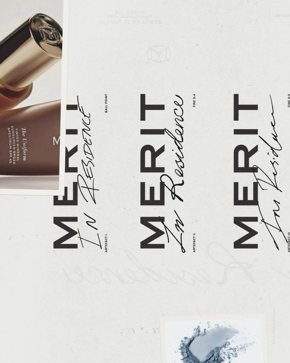 MERIT In Residence posters in a row beside a MERIT lipstick and compact