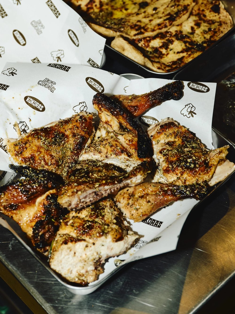 Charred chicken on Kokoras printed paper