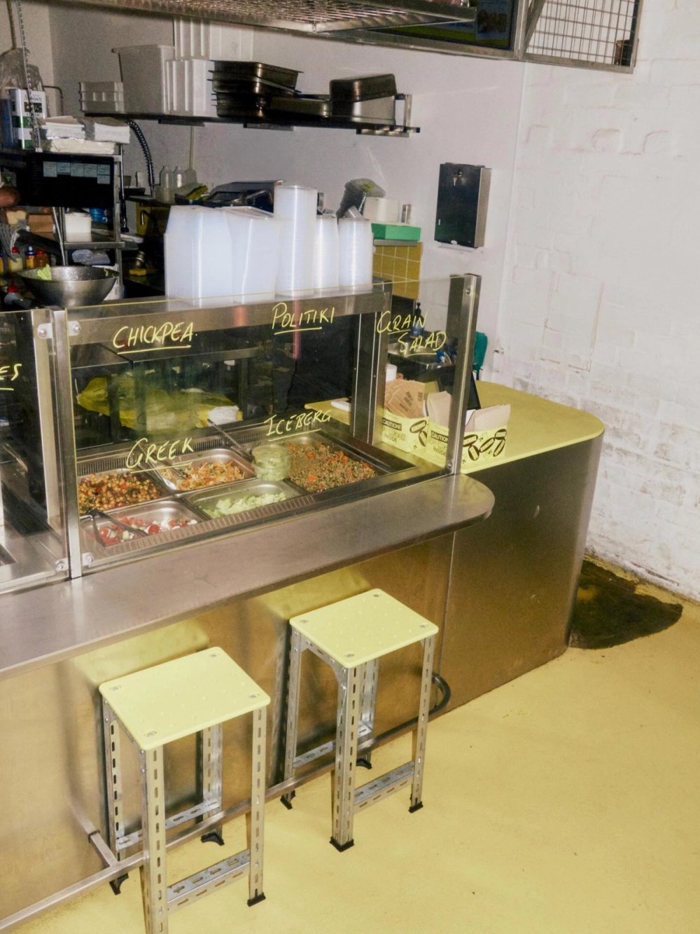 The Kokoras counter with yellow stools
