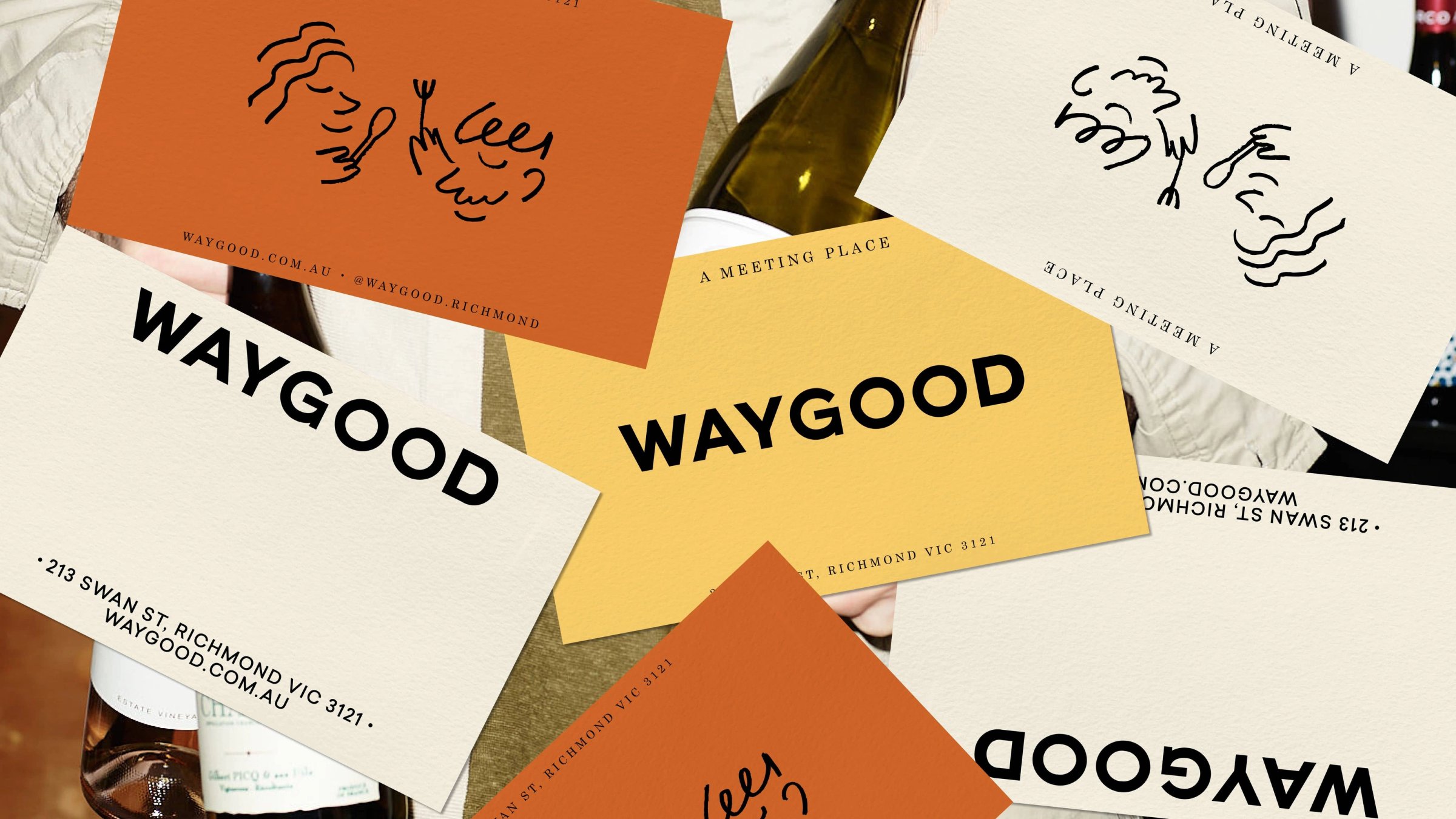 Waygood business cards in cream, yellow and orange