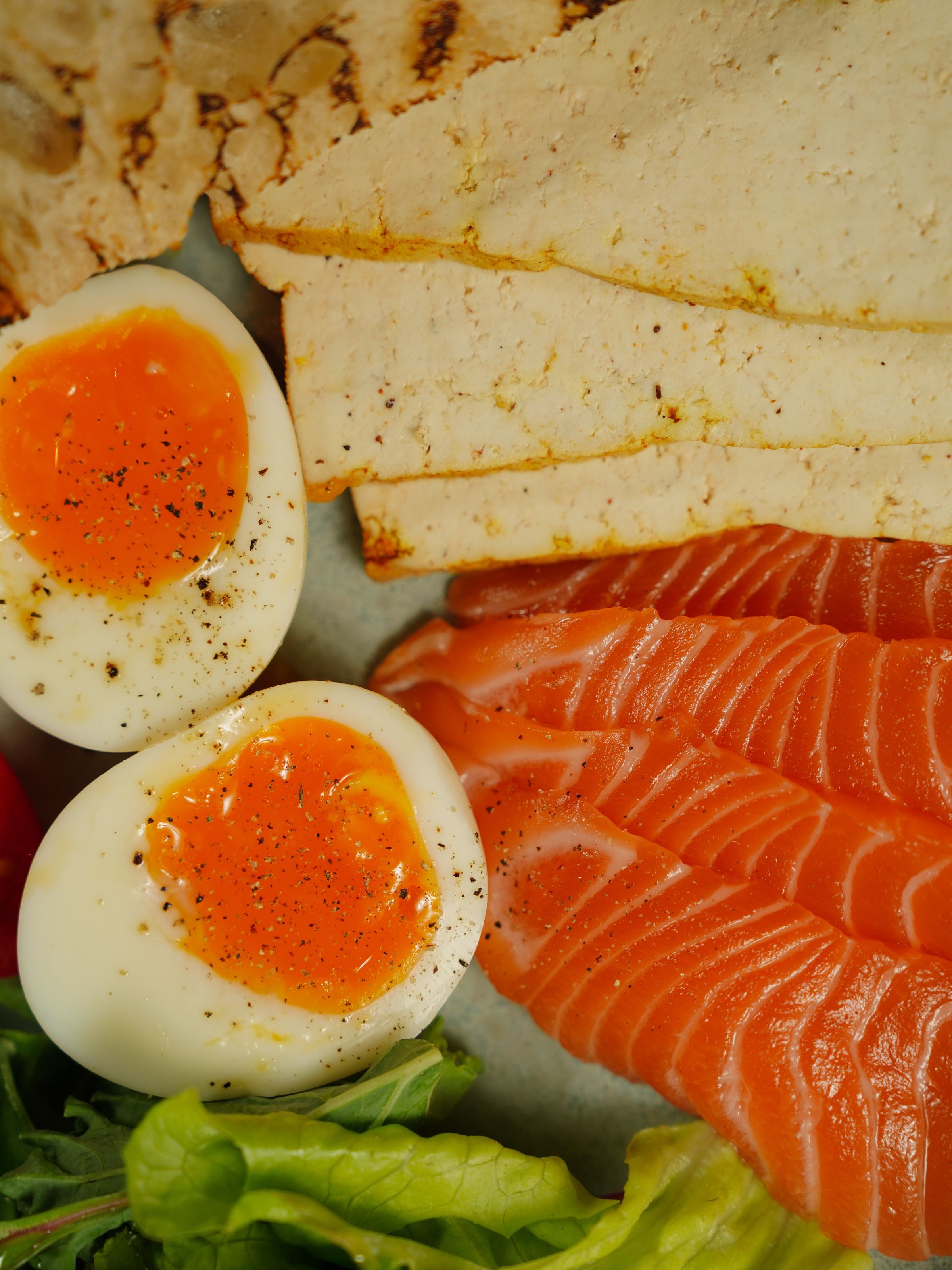 Eggs and salmon arranged as part of a meal.