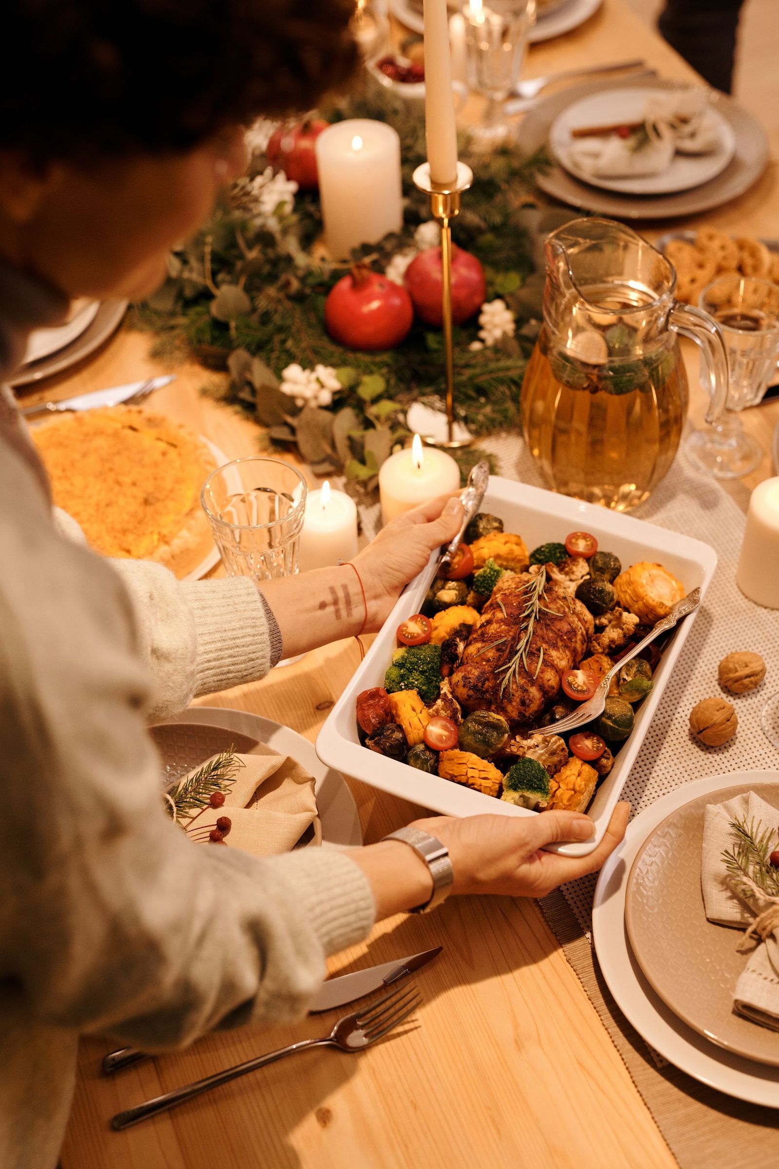 A festive dinner table with food being served.