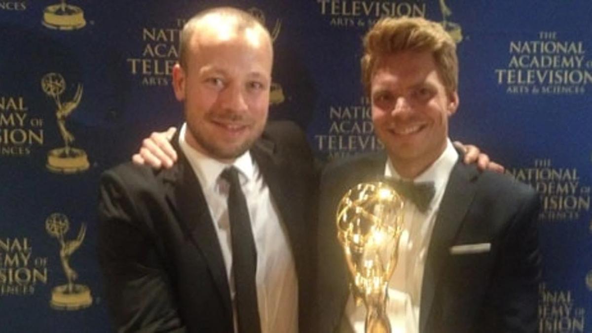 Tor Castensson and Calle Stenqvist holding their Emmy Award for JFK Coulds over Cuba