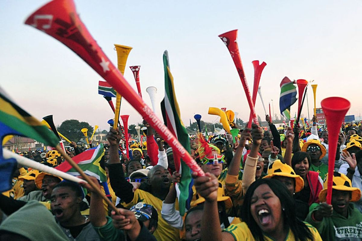 The spectators of the 2010 World Cup South Africa with mandatory accessories are always below, the vuvuzela trumpet. (Wikimedia Commons)
