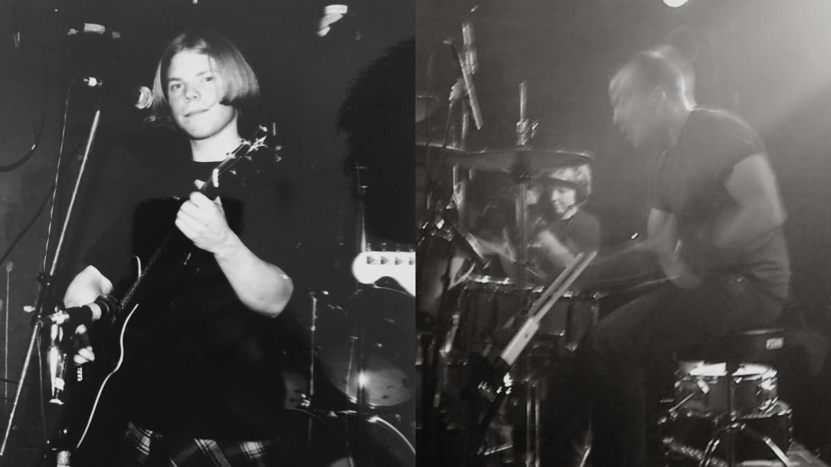 Calle playing guitar and singing while Tor plays the drums.