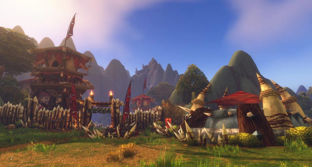 A Horde outpost with red banners and tusked gateways