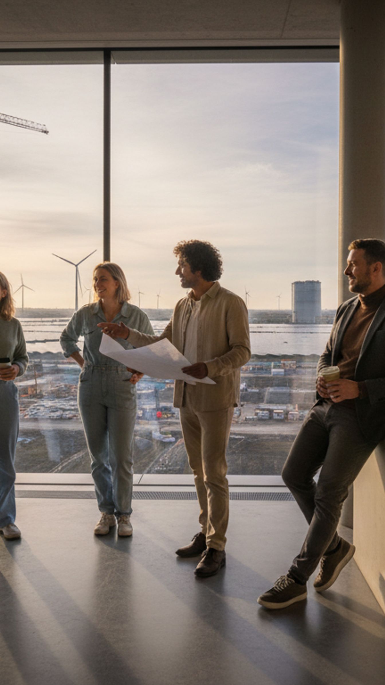 Team of bridge builders in an industry environment