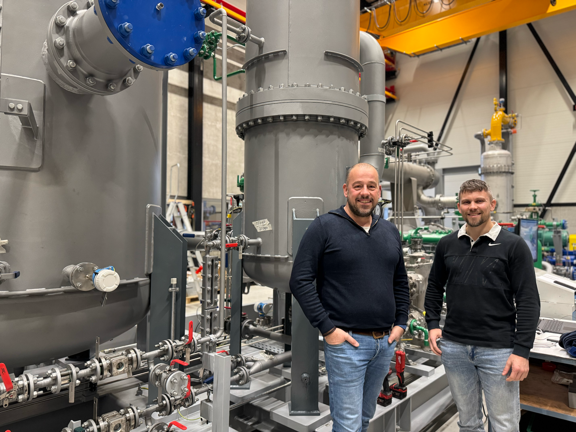 Twee mannen voor industriële machines