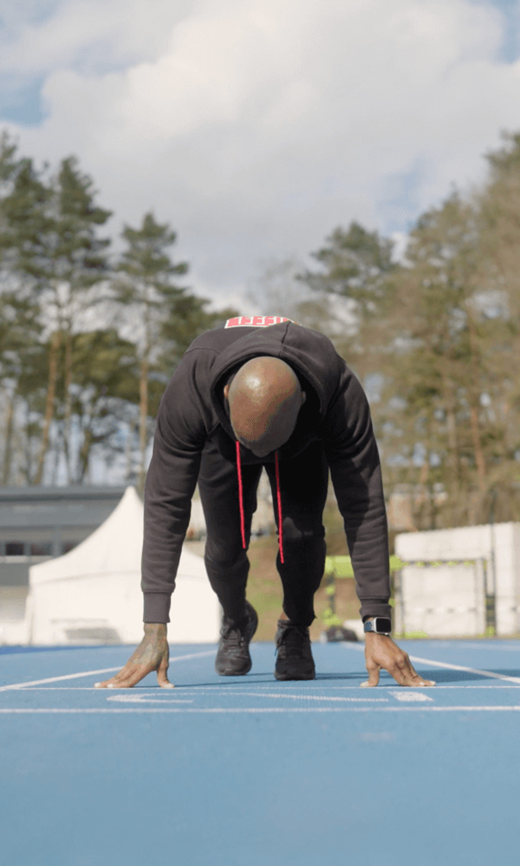 Topsporter Churandy op een atletiekbaan